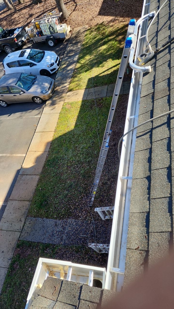 Gutter Cleaning using water by Power Wash Masters LLC