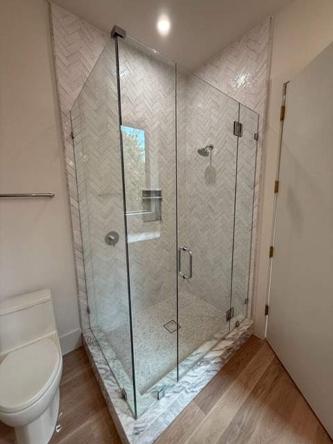 Multiple Frameless Shower Installs by Richardson Glass & Mirror