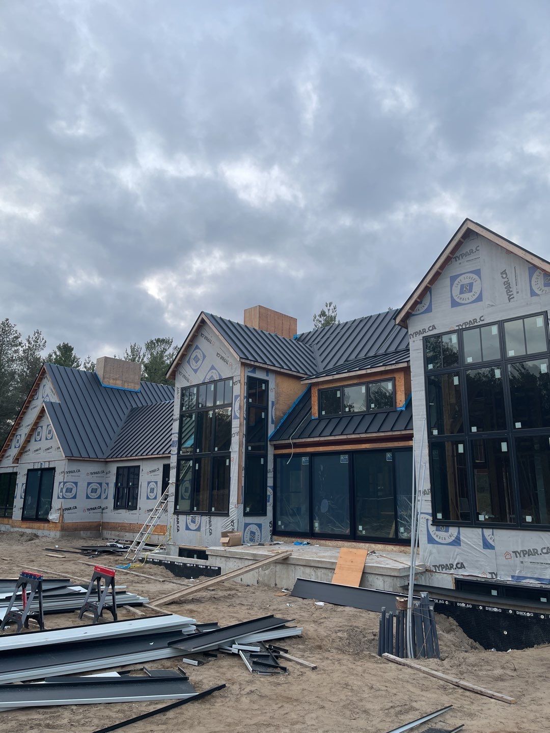 New Home Construction using 16" Standing Seam Panels by Jay Carter Roofing & Sheet Metal