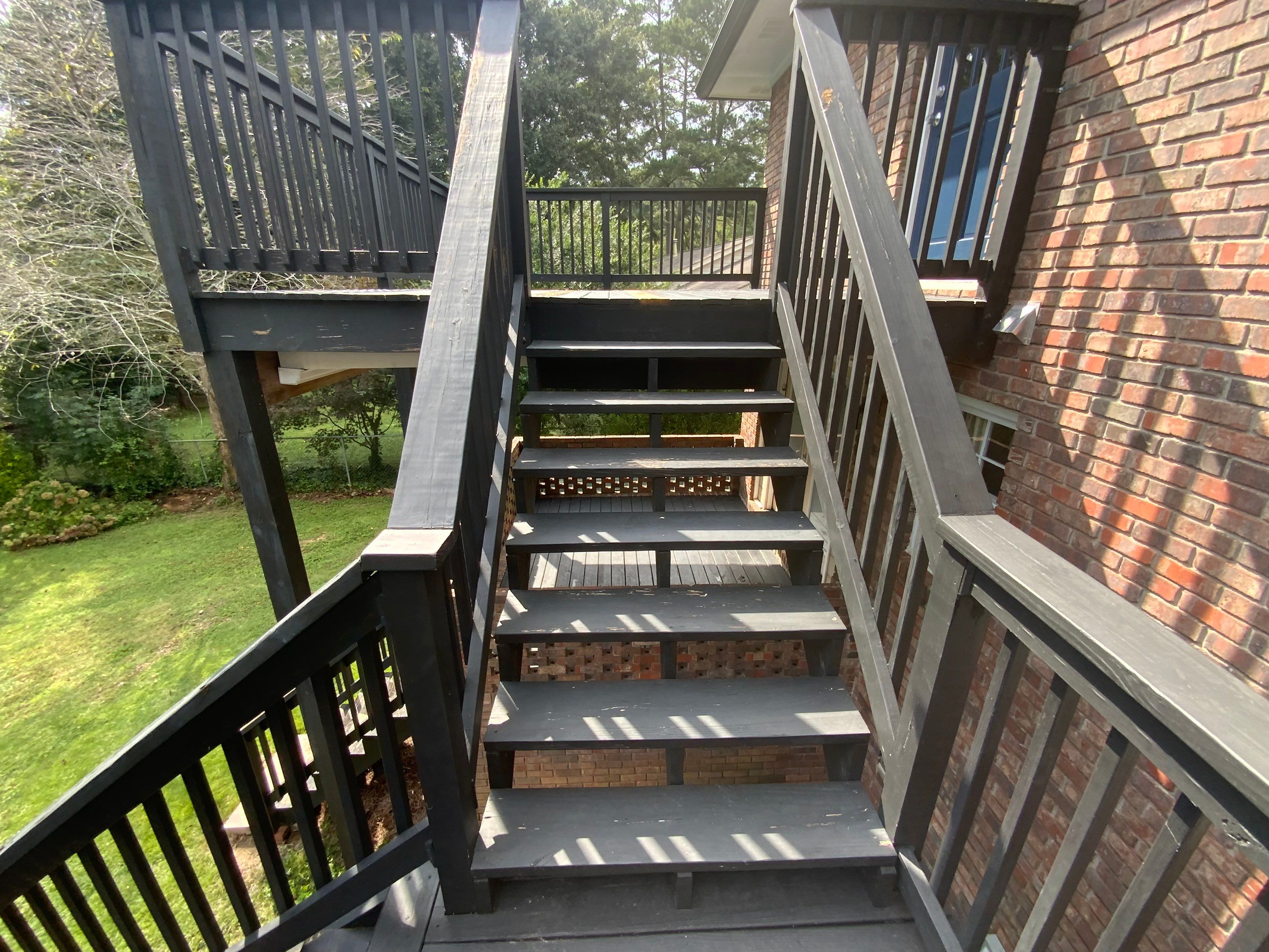 Full Exterior Trim Painting and Multi-Level Deck Staining by Swift Home Renovations