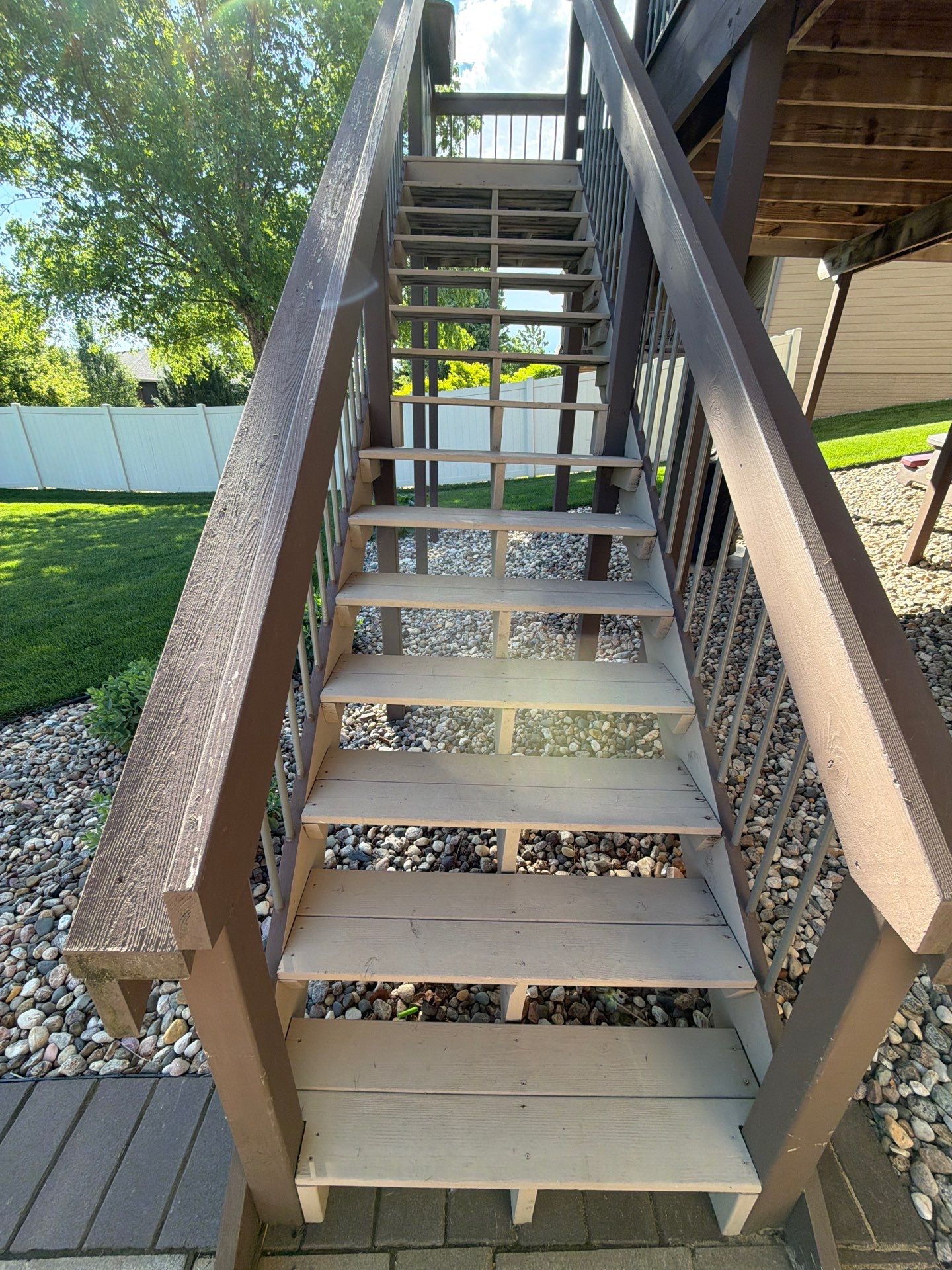 Sioux Falls Exterior Refresh and Multi-Level Deck Maintenance by Select Painting, Coatings & Garage Cabinets