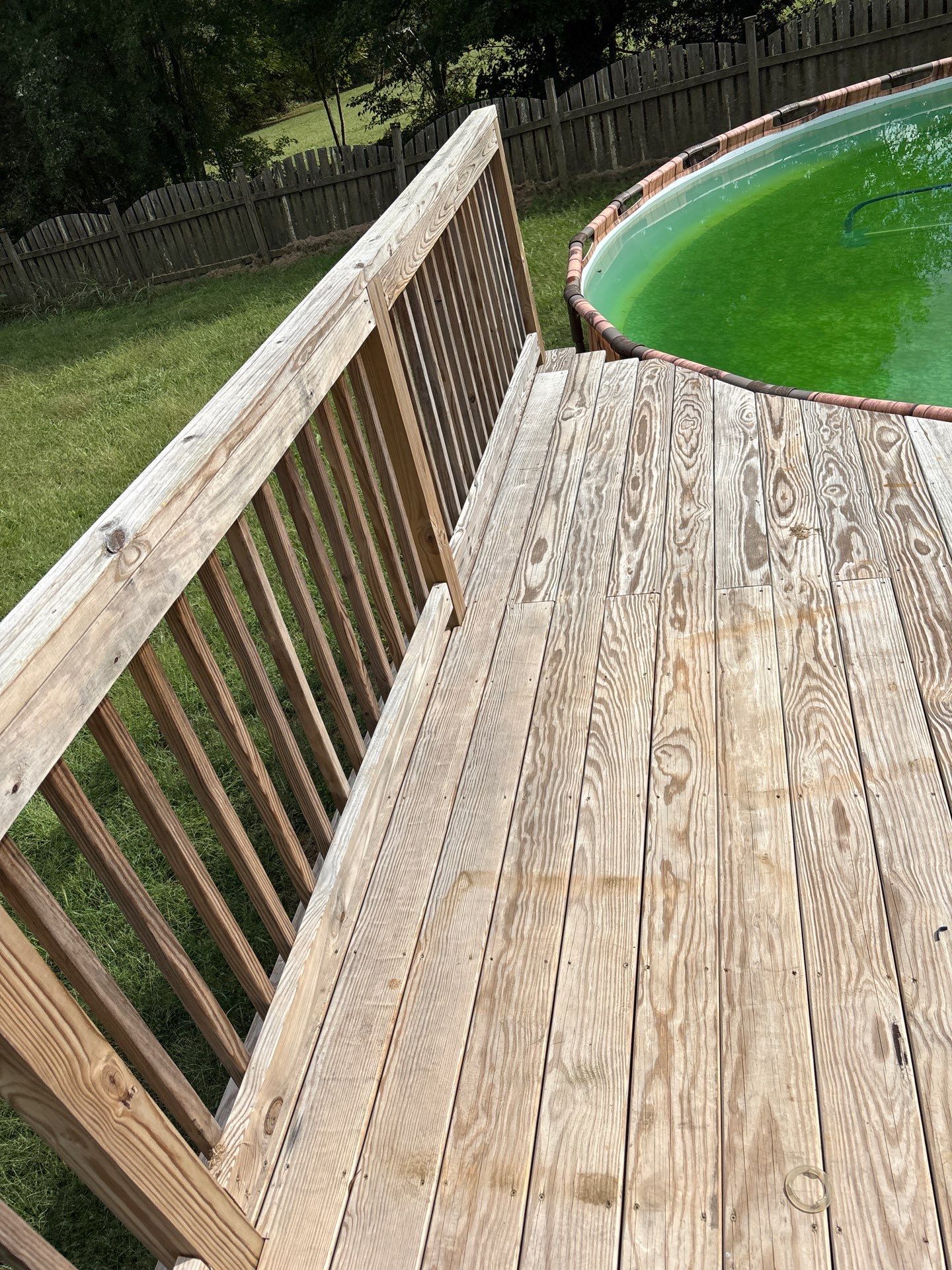 Concrete Walk Way and Wood Deck using Wood and Concrete Sealant by DuraSeal