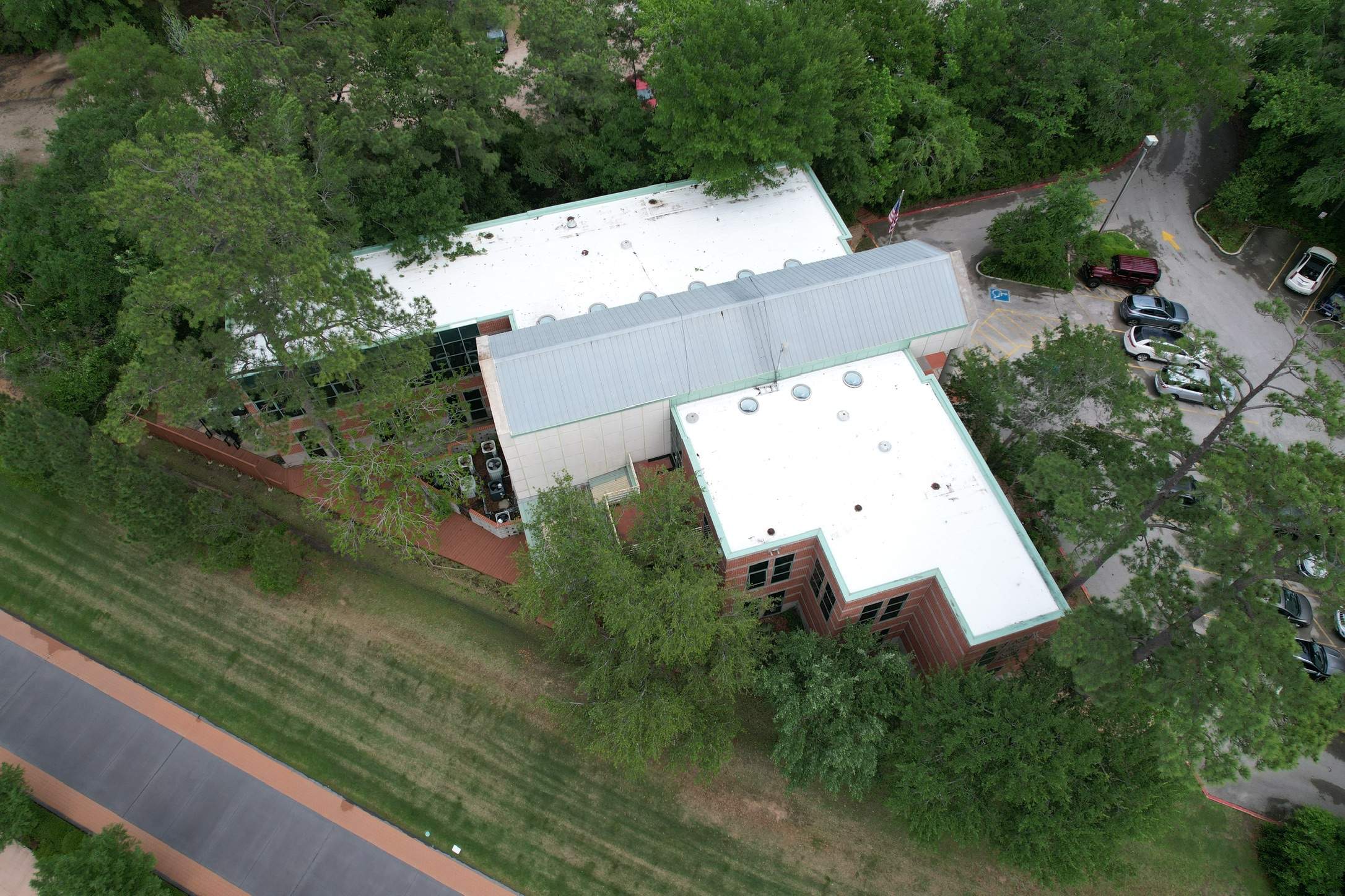 Commercial Roofing Restoration using GAF Unisil Silicone by STX Roofing