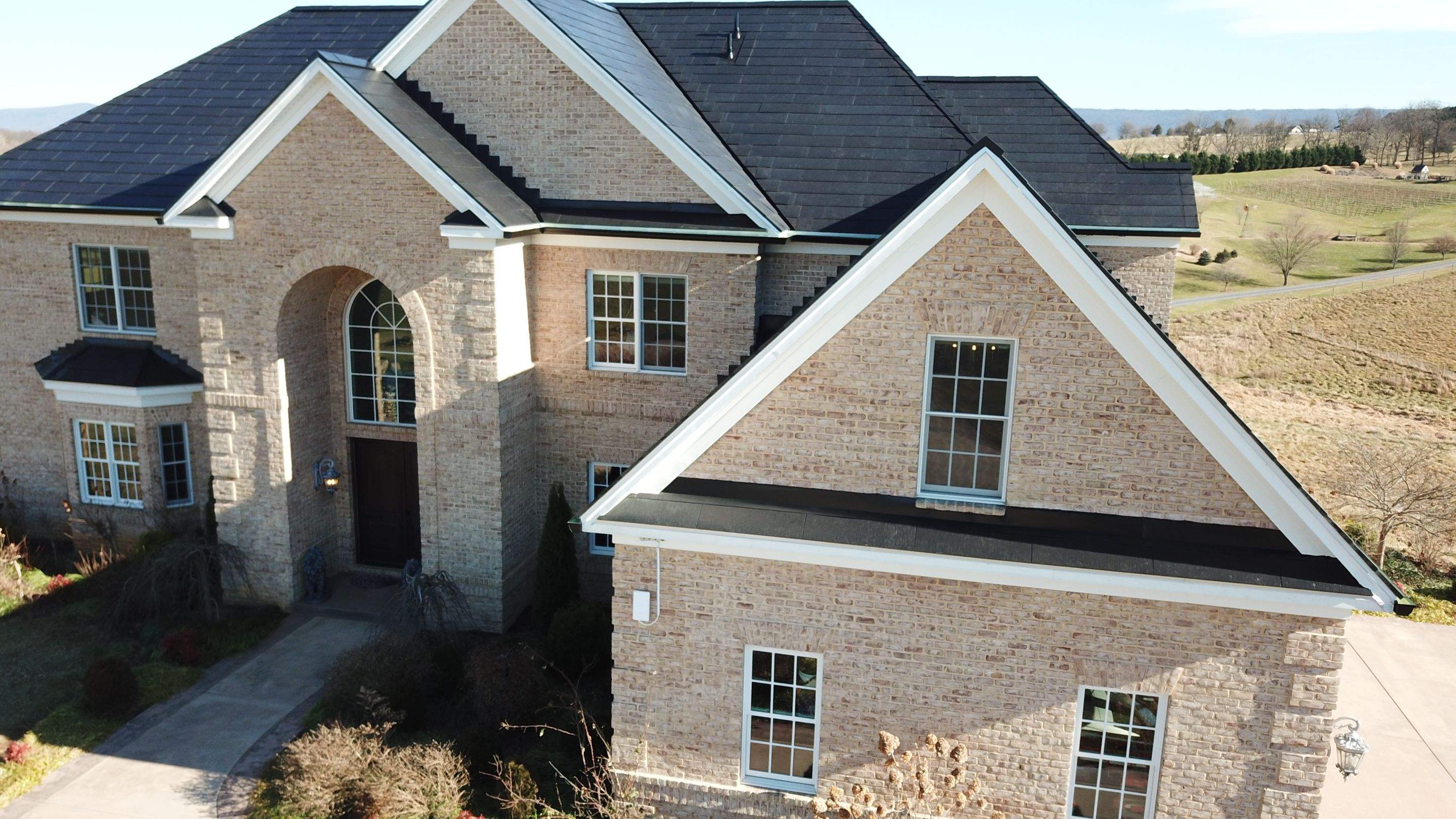 Tesla Solar Roof Replacement  by American Home Contractors