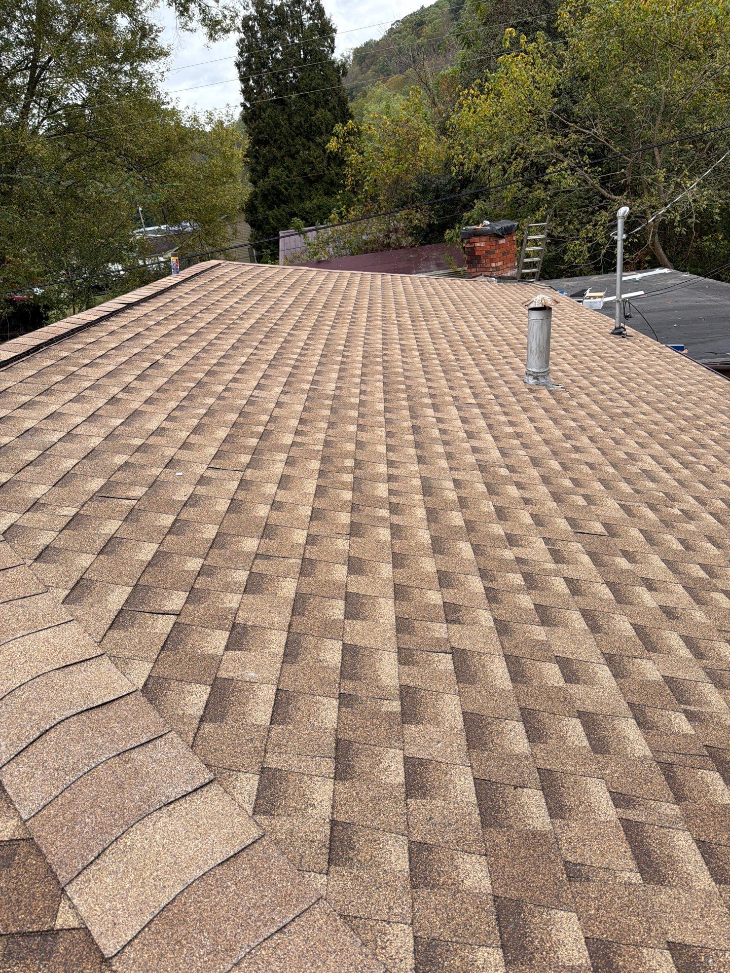 Residential Roofing Installation using GAF Timberline HDZ Shakewood by Rainstoppers Roofing