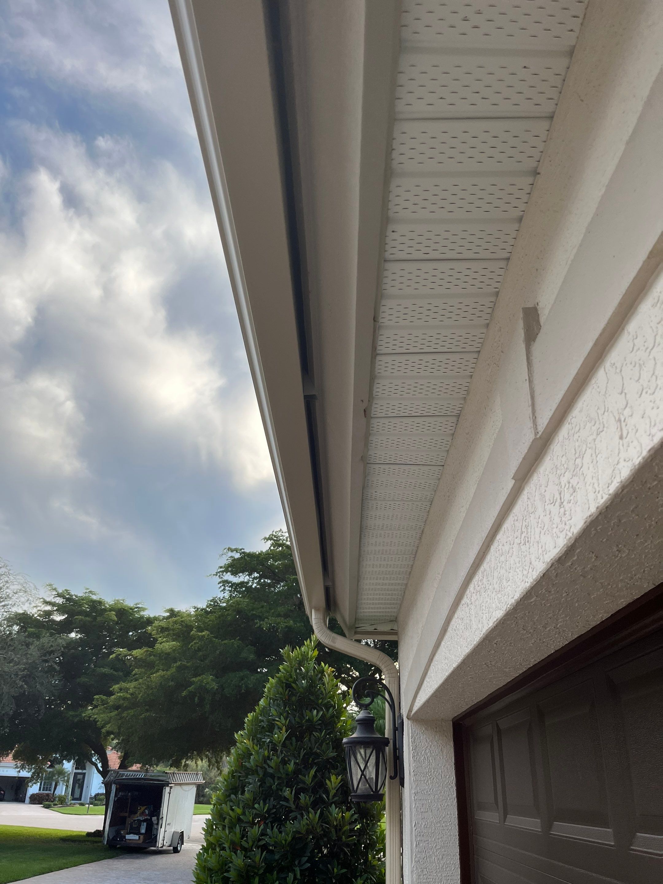 6-inch K-style Gutters with New Splash Guard in Bonita Spring FL by Gutter Professors