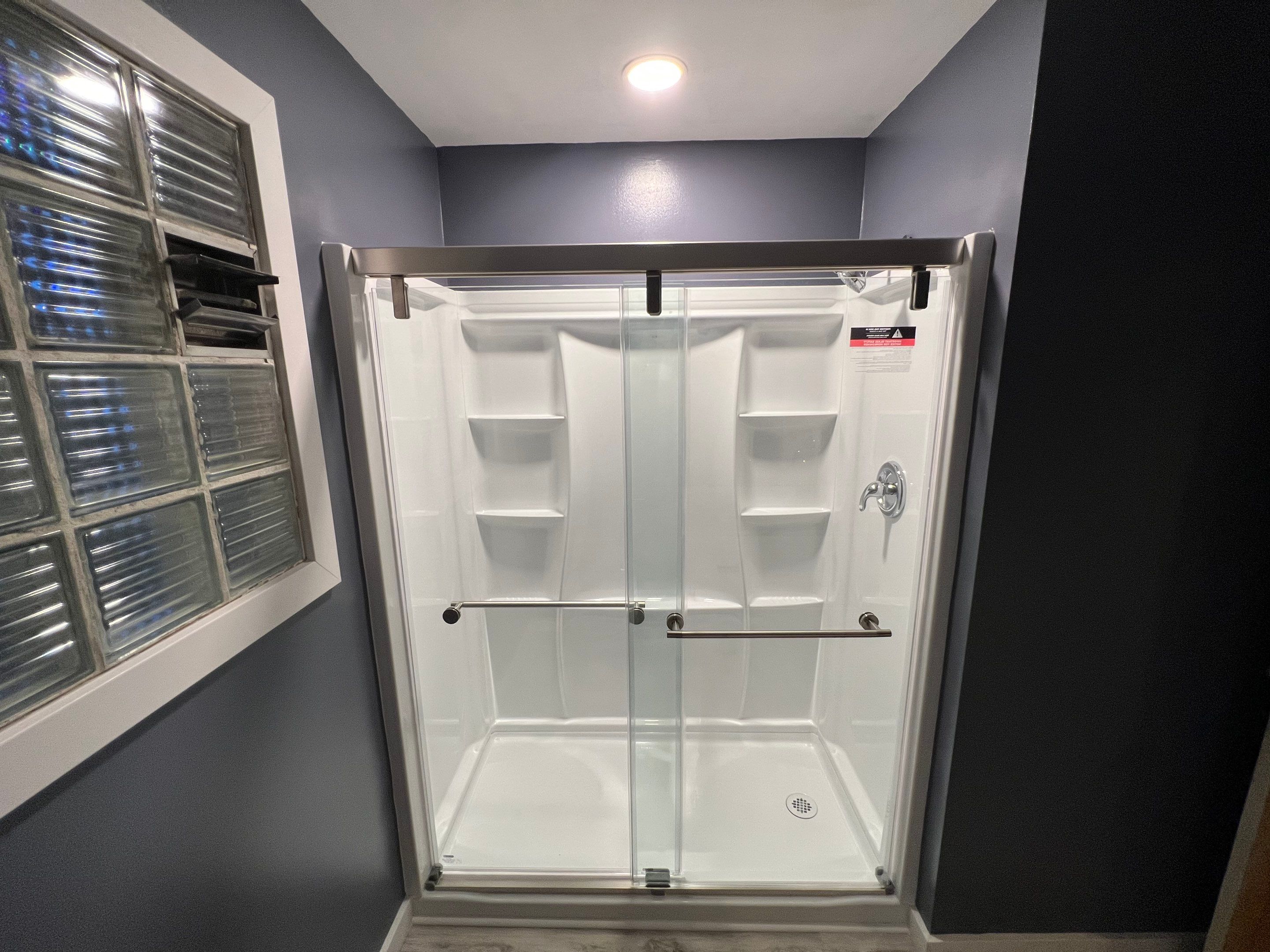 Bathroom Remodel using Shower Kit by Villegas Remodeling, LLC