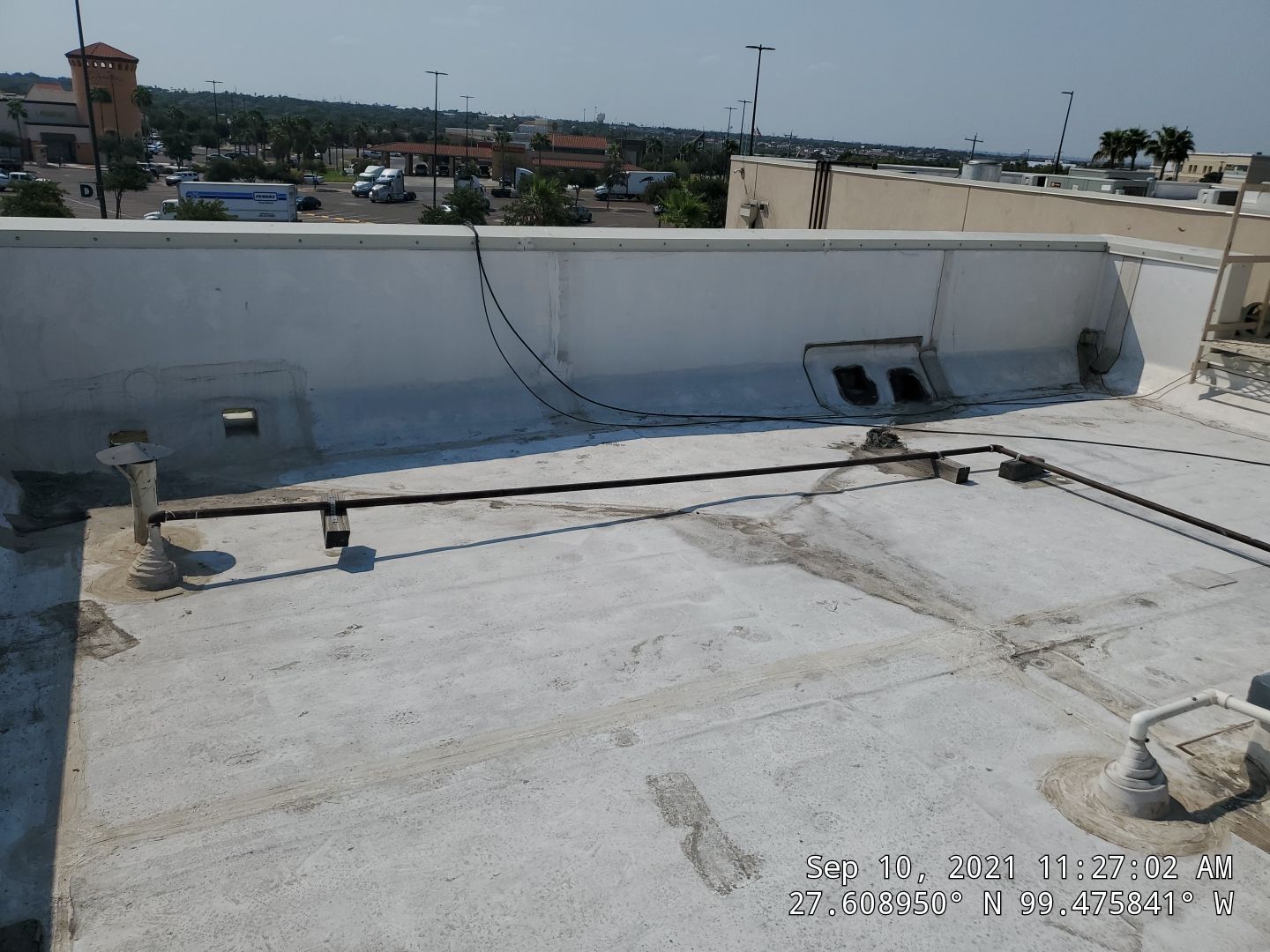 Commercial Roofing Repair using Silicon Roof Coating by JM Flores Roofing & Construction, Inc