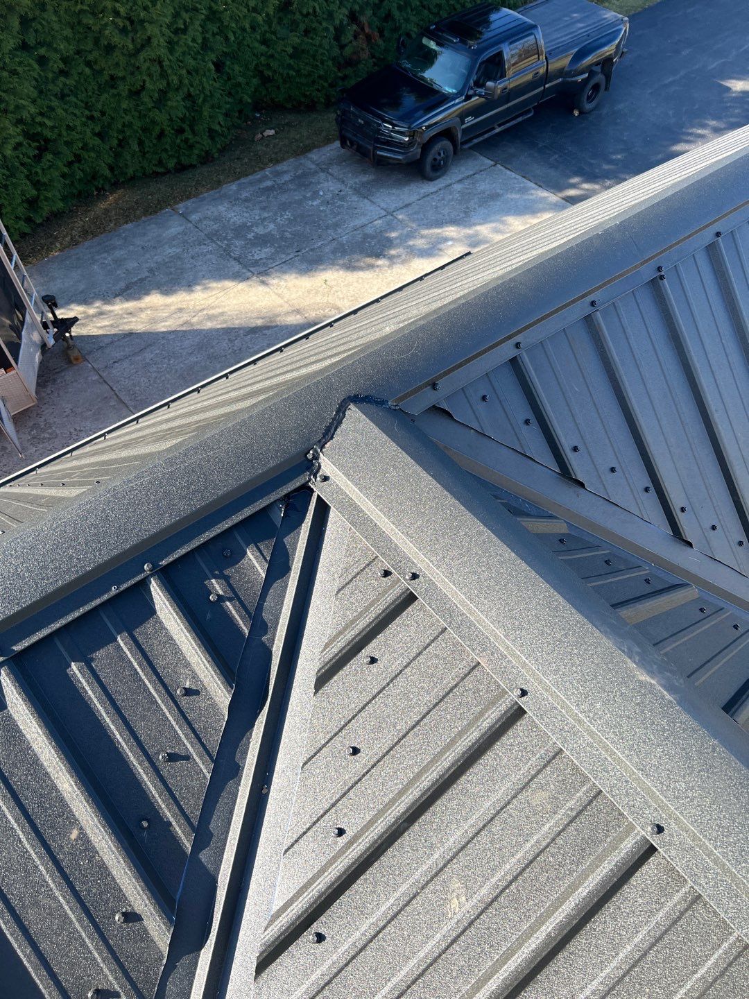 Residential Roofing Installation using Performance Panel Metal - Frost Black by RoofX 