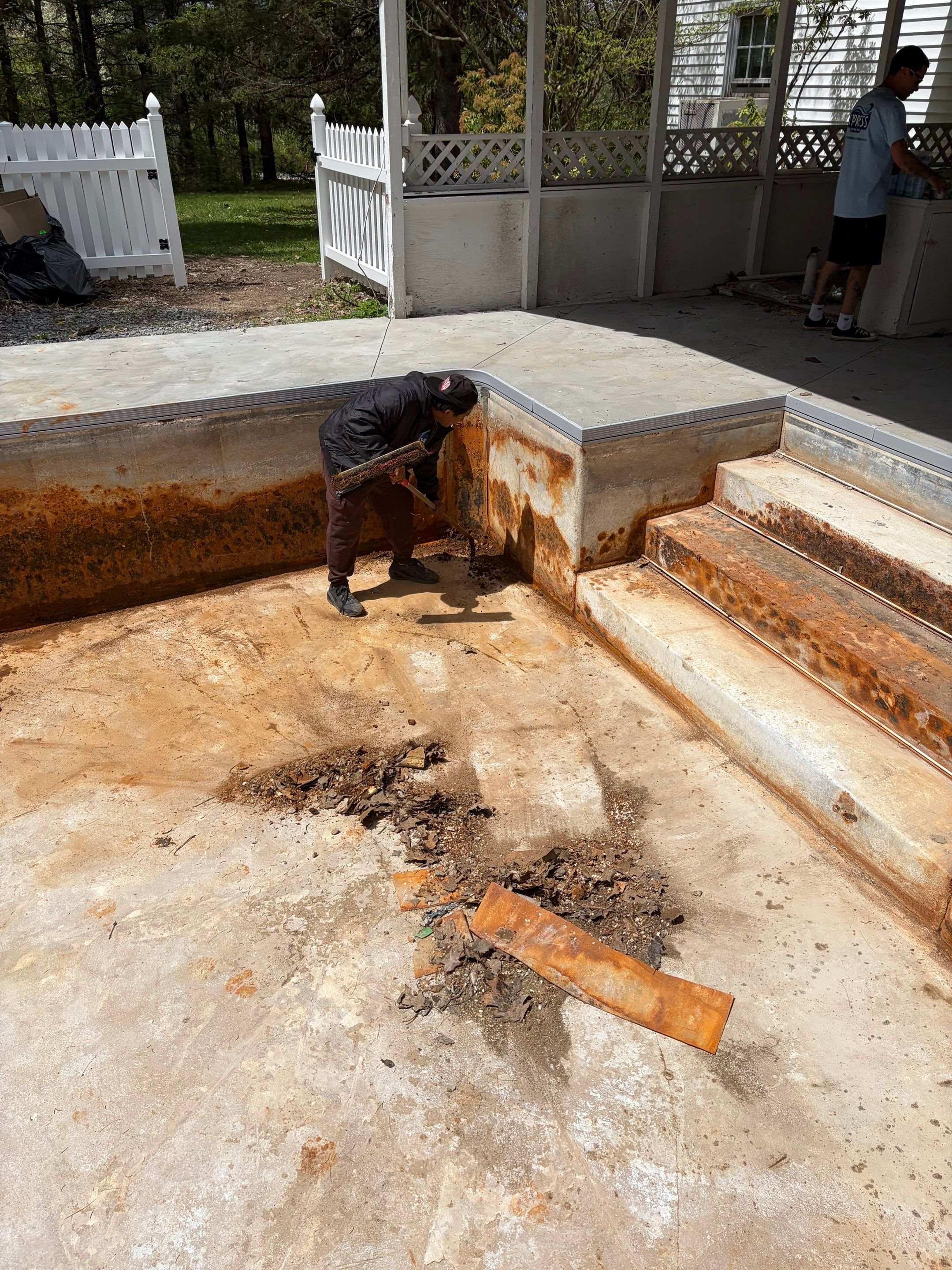 In-Ground Swimming Pool Renovation and Concrete Decking in Old Chatham by Cypress Pools and Spas