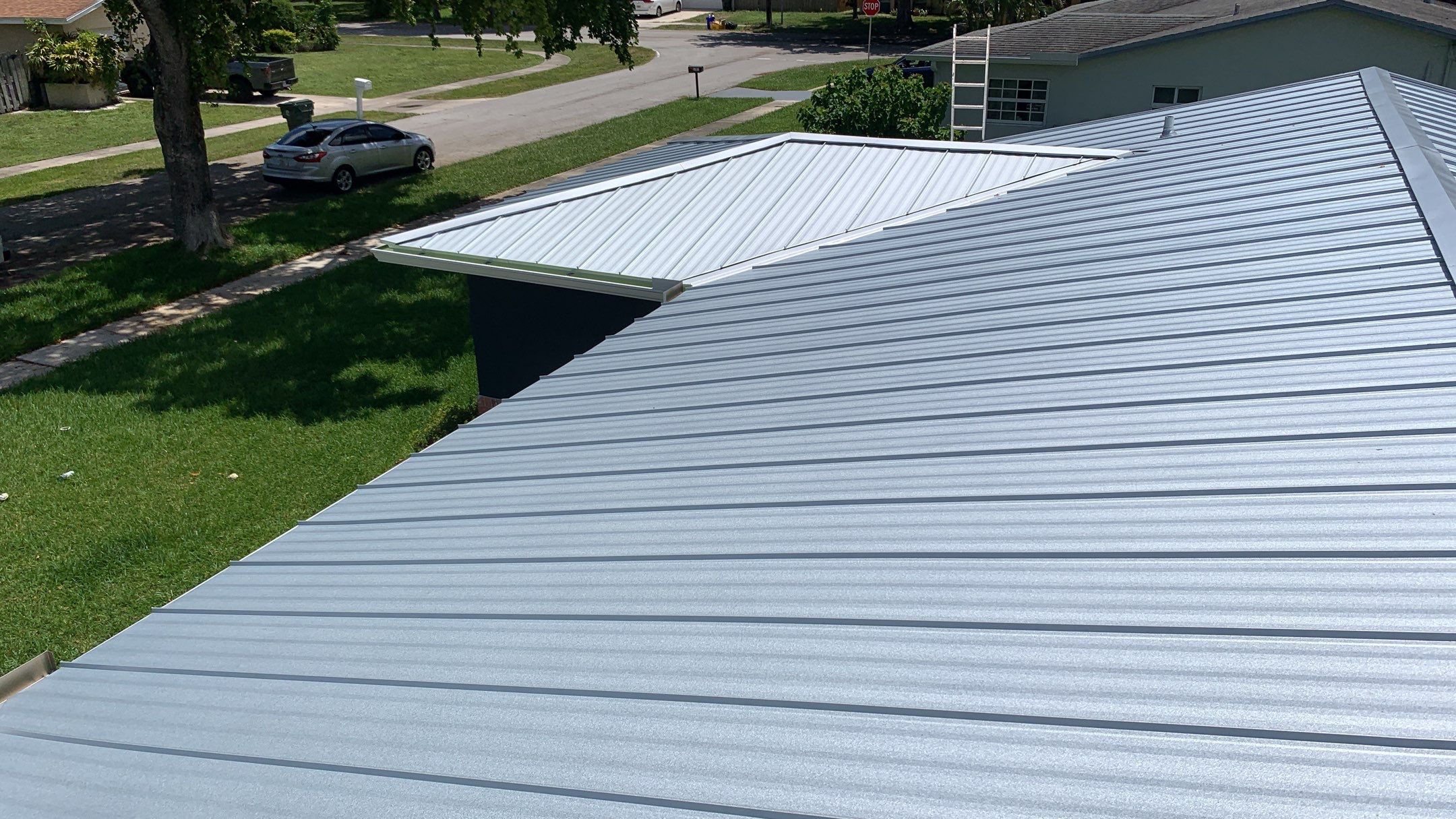 Residential Roofing Installation using 1" Nail strip metal roof by BLUES BROTHERS ROOFING