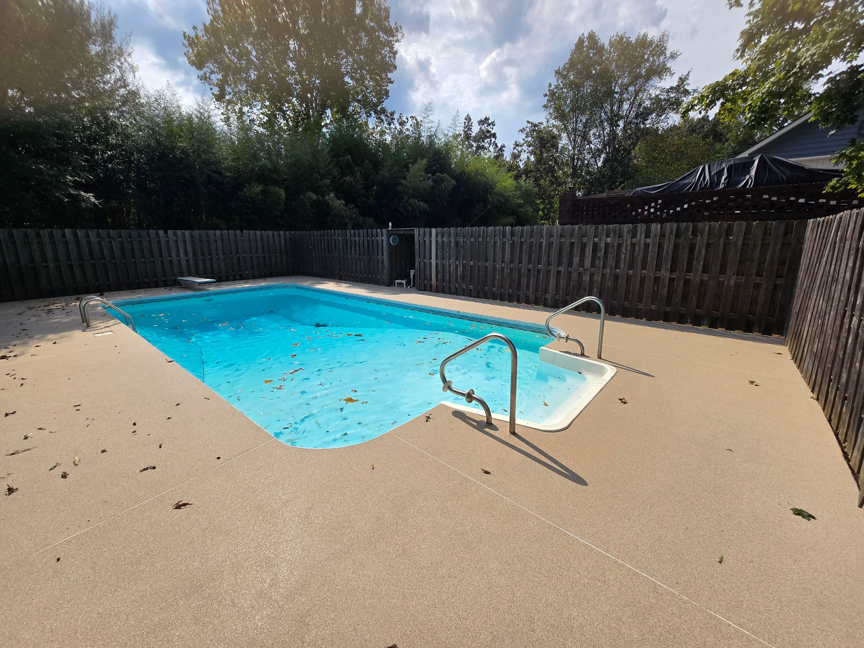 Pool Deck & Porch Completed Using Biscuit & Obsidian by Elite Floor Solutions