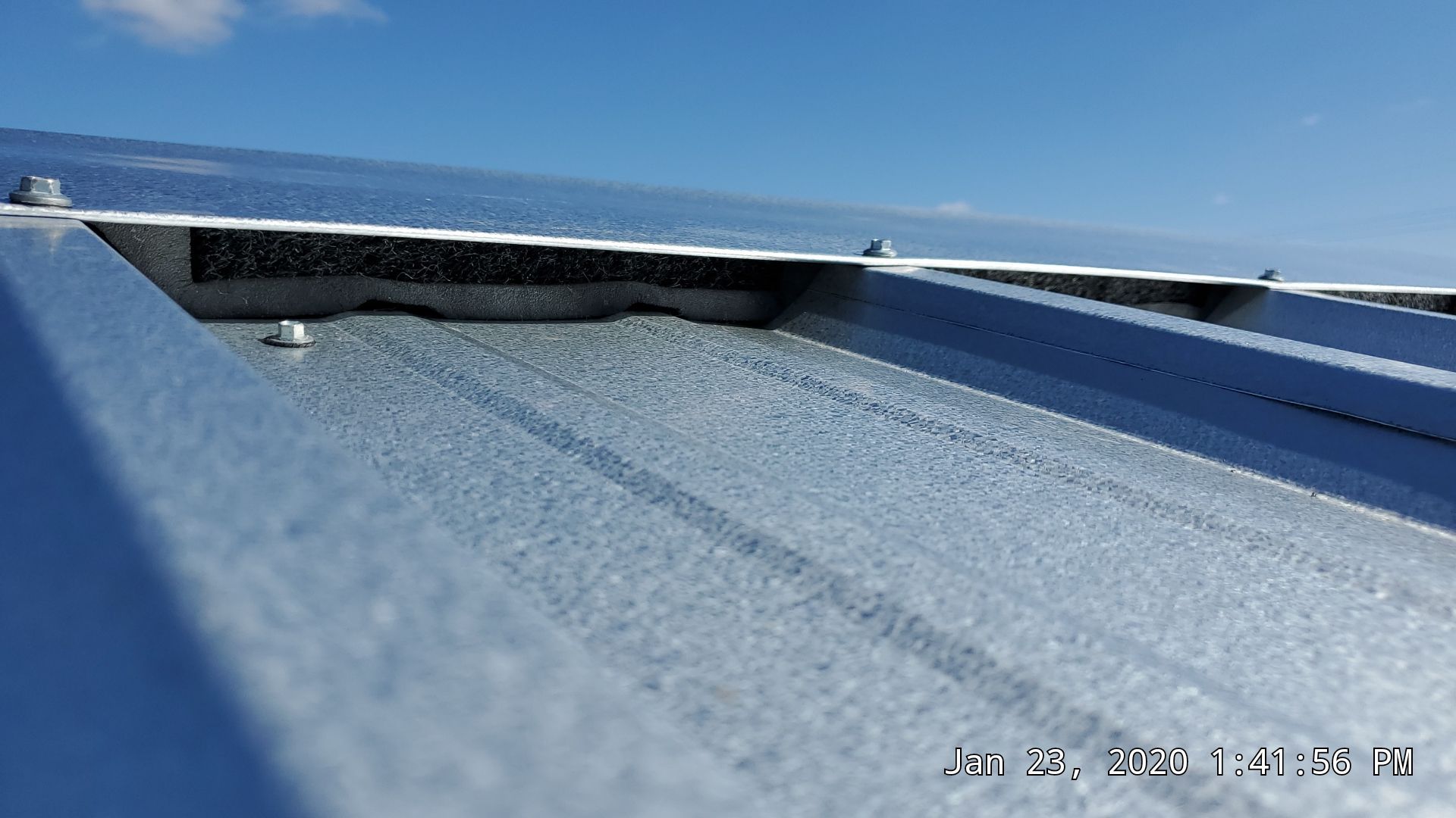Residential Roofing Installation using PBR Metal Roof by Harvey Roofing & Construction