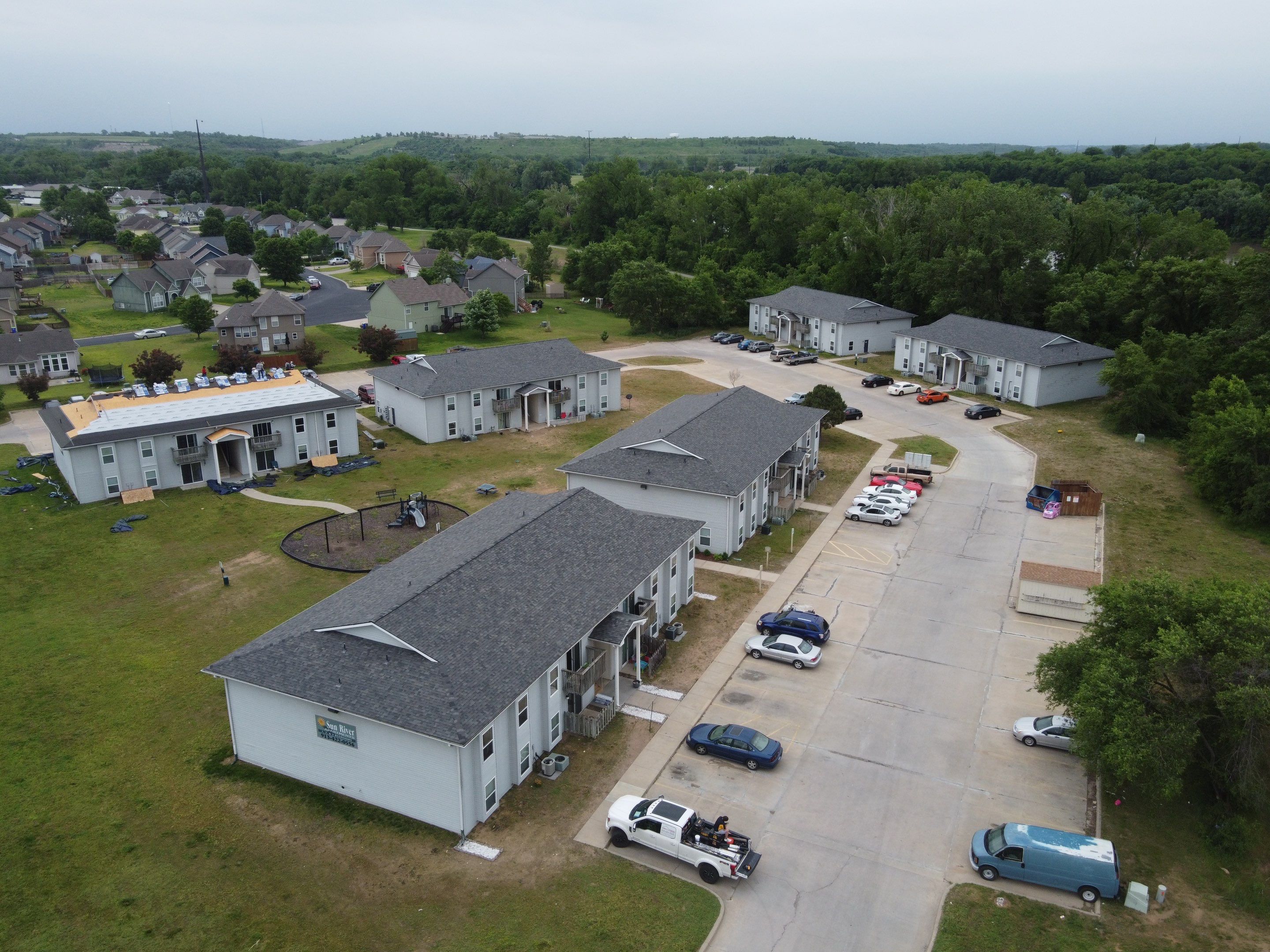 Multifamliy Complex ROOF REPLACEMNT with Ventilation Upgrades using Malarkey Vista Class III IR Shingles by Gorilla Exteriors Contracting, LLC