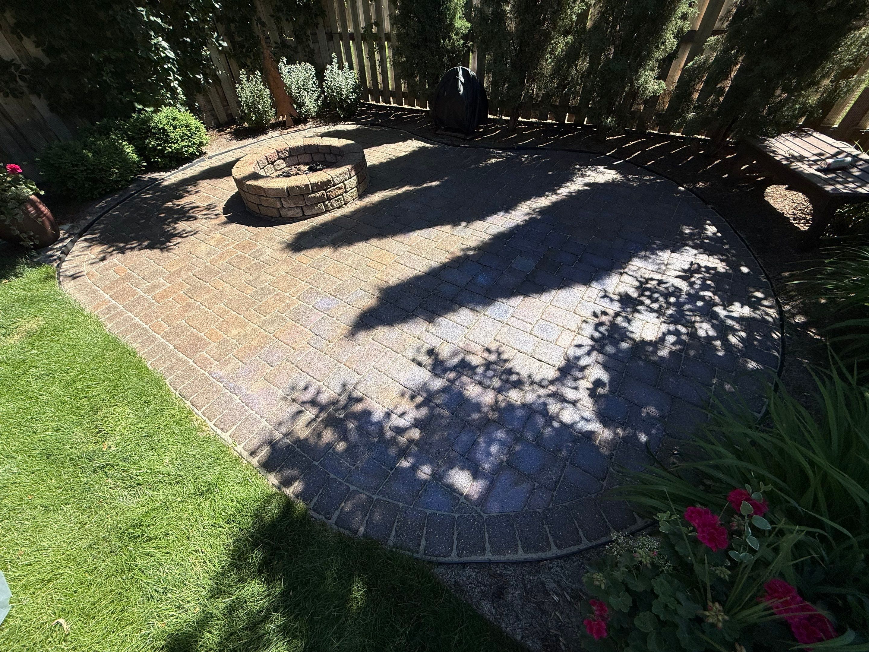 Textured Concrete Coating and Paver Patio Refresh in Sioux Falls by Select Painting, Coatings & Garage Cabinets