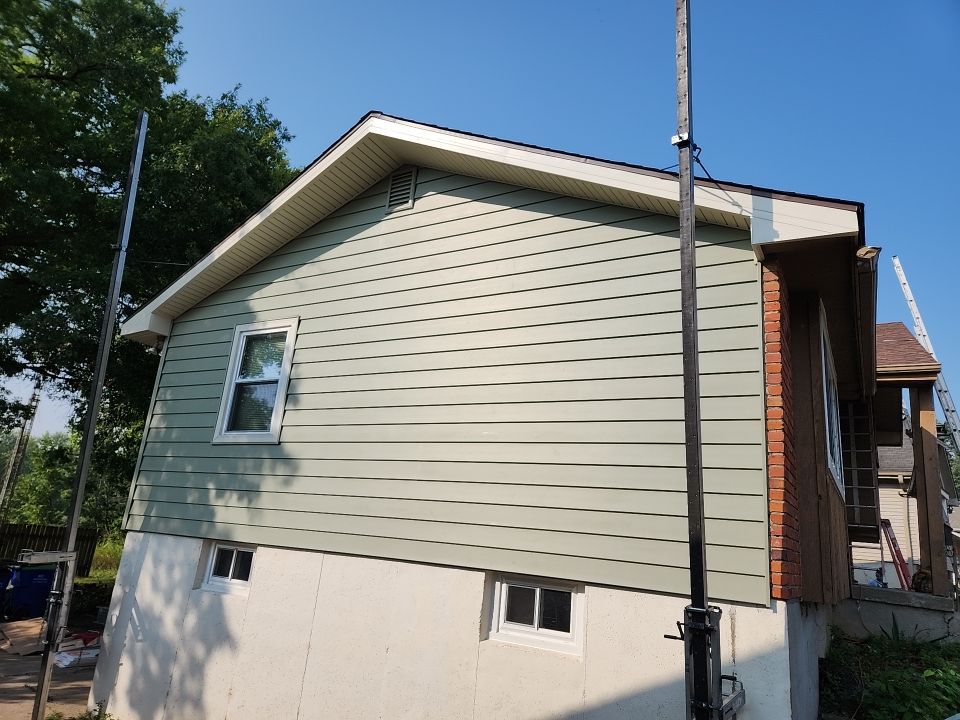 Siding Installation using Crane board D7 by EEC  Windows, Siding & Roofing 
