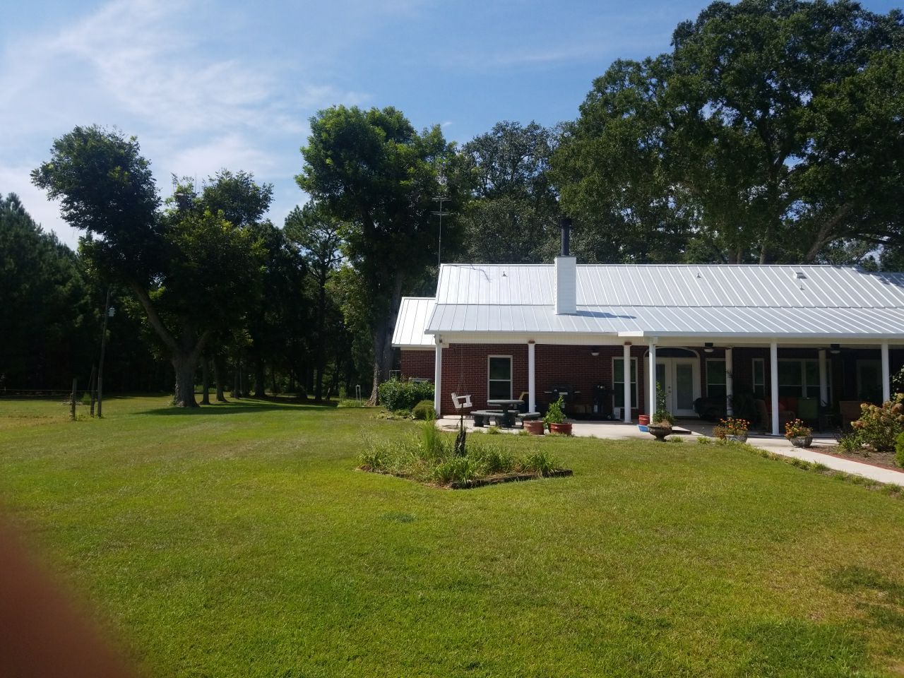 Residential Roofing Installation using Metal roofing by American Roofing & Construction LLC
