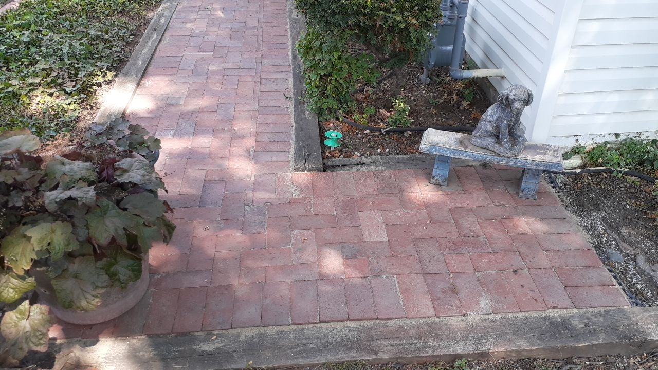 Uneven Patio Repaired! by LAND ESCAPES LLC