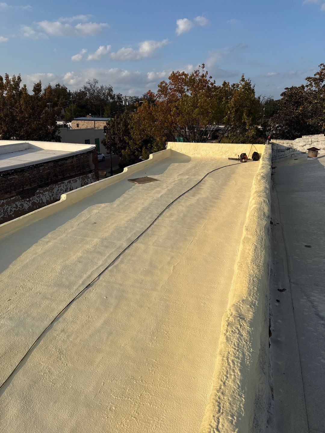 Heath Hyde, P.C. – Commercial Foam Roof Restoration in Sulphur Springs, TX by All Star Roofing LLC