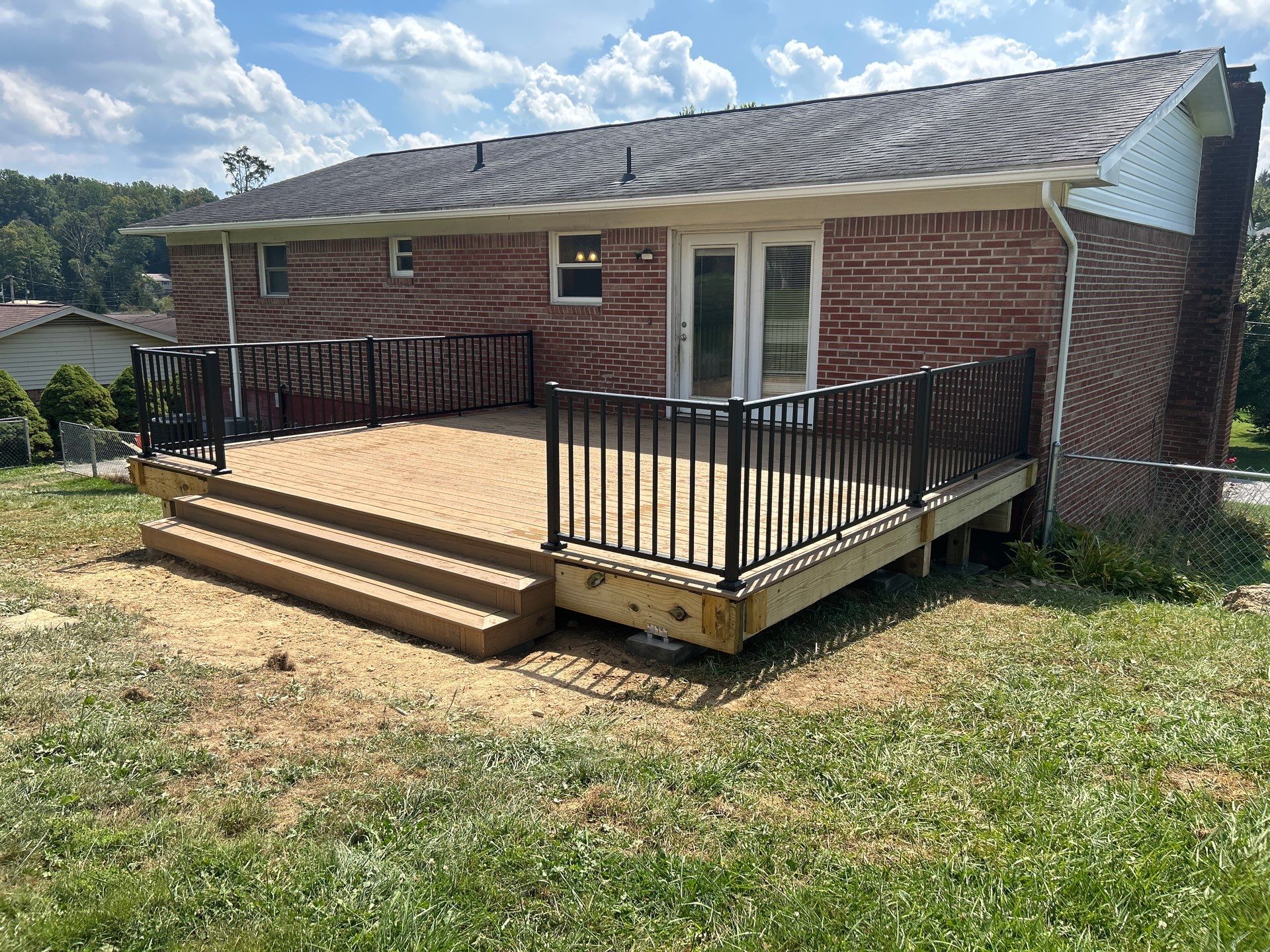 Composite Deck Replacement and Metal Railing Installation in Beckley by Walnut Hollow Decks & Outdoor Living