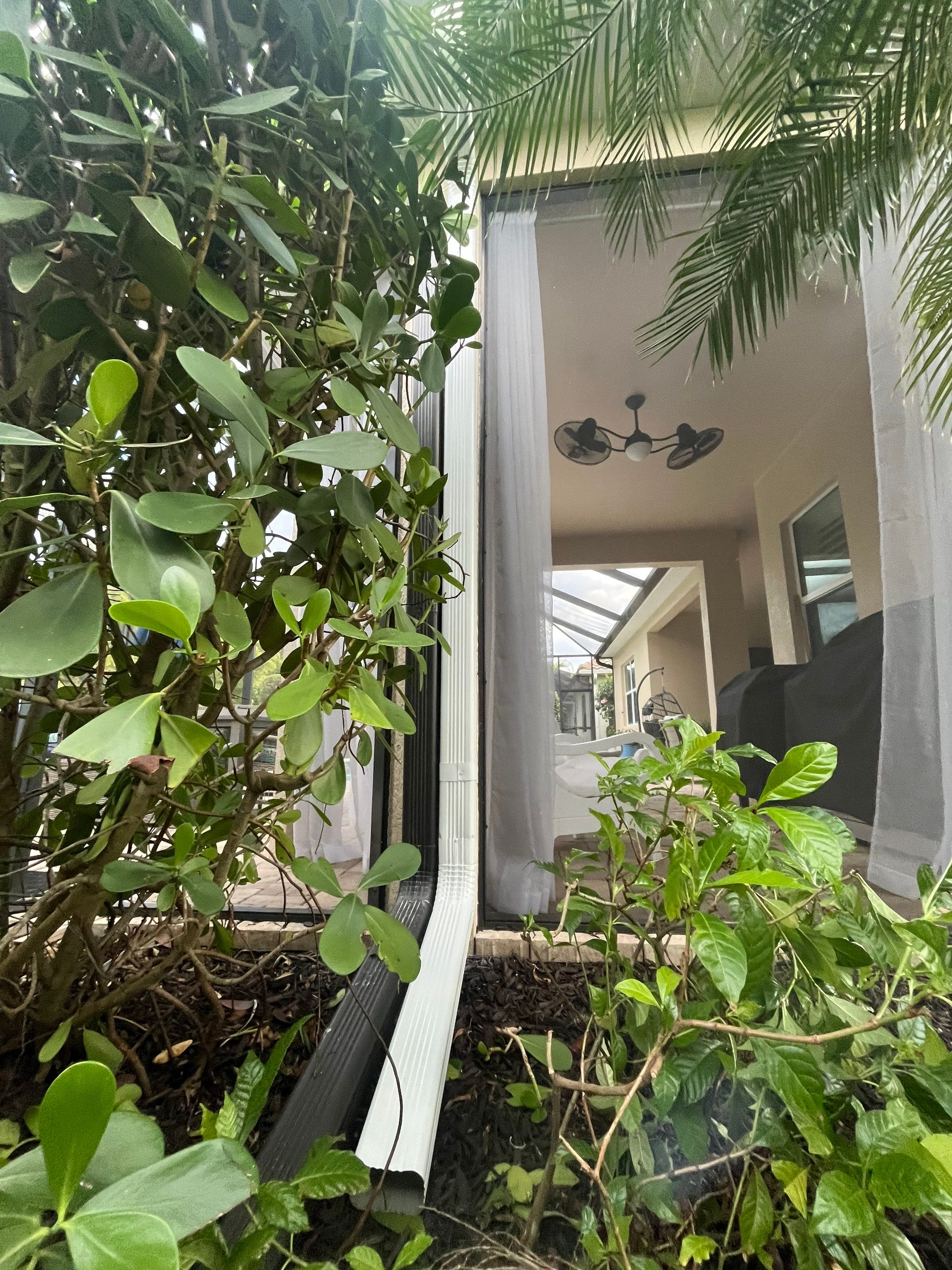 Downspouts using White Down Spouts in Fort Myers FL by Gutter Professors