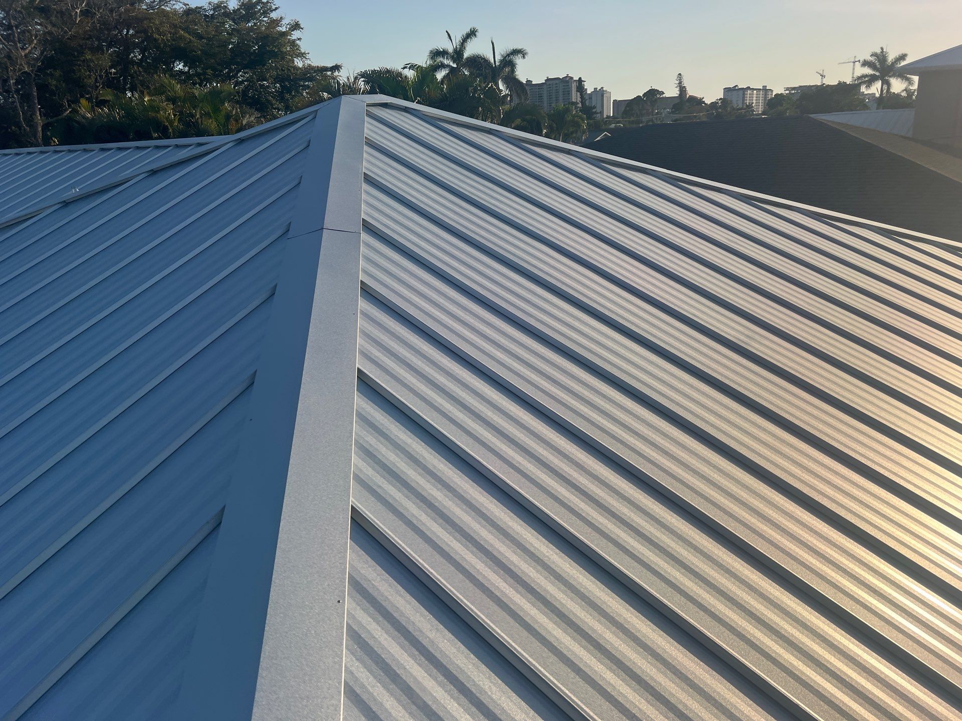 Residential Roofing Installation using Galvalume Standing Seam by Durabilis Roofing INC