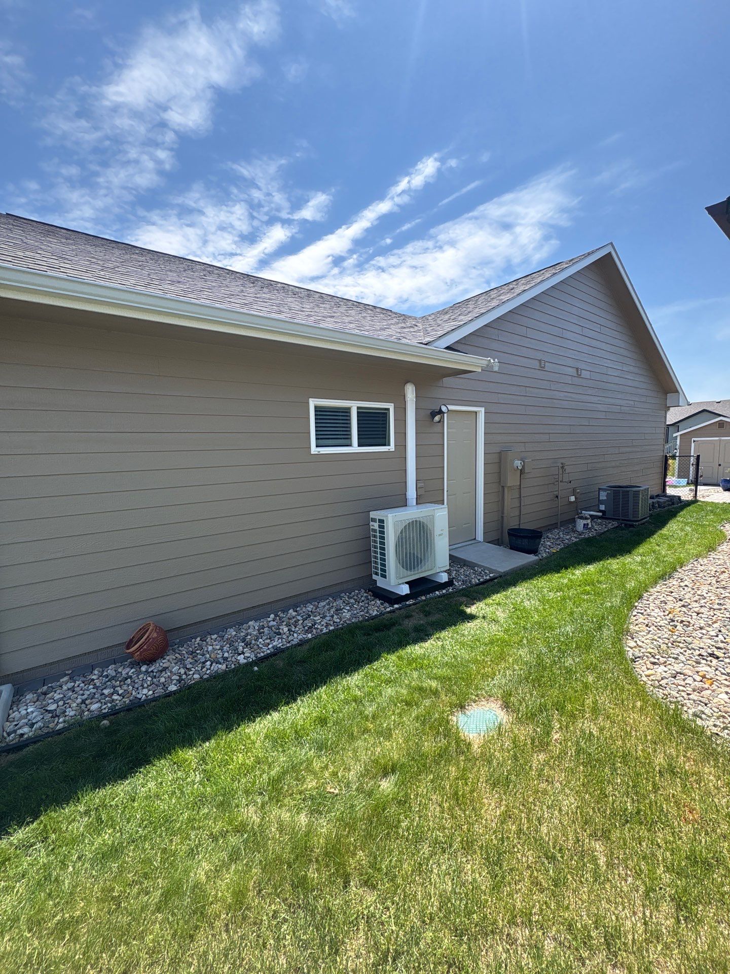 Residential Exterior Painting and Siding Refresh in Sioux Falls by Select Painting, Coatings & Garage Cabinets