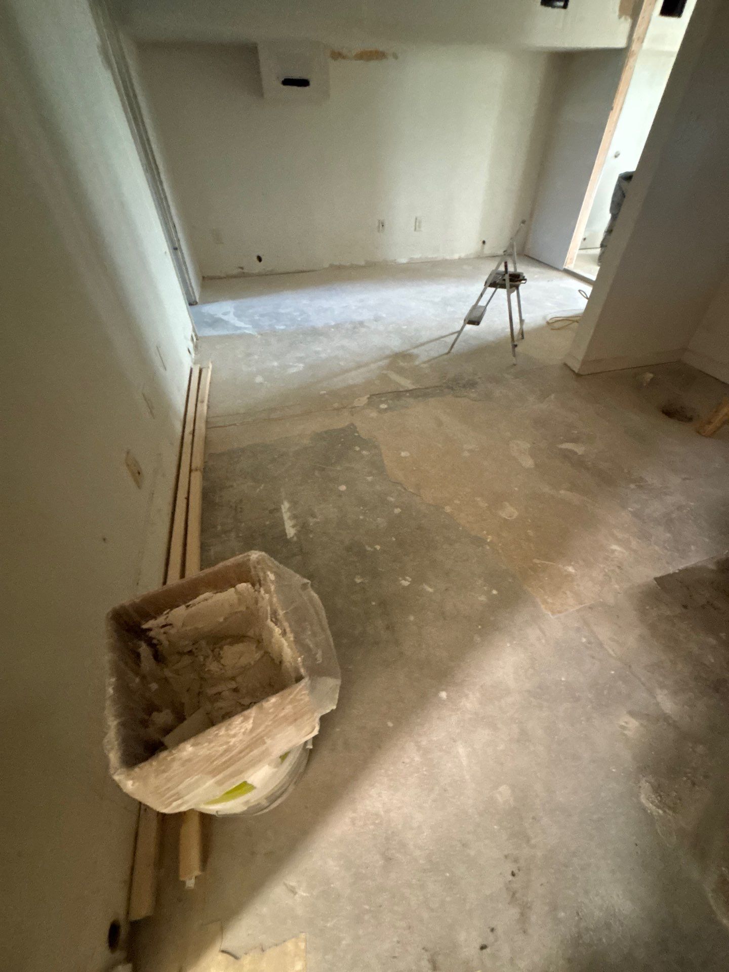 Comprehensive Basement Concrete Floor Coating and Crack Repair in Sioux Falls by Select Painting, Coatings & Garage Cabinets