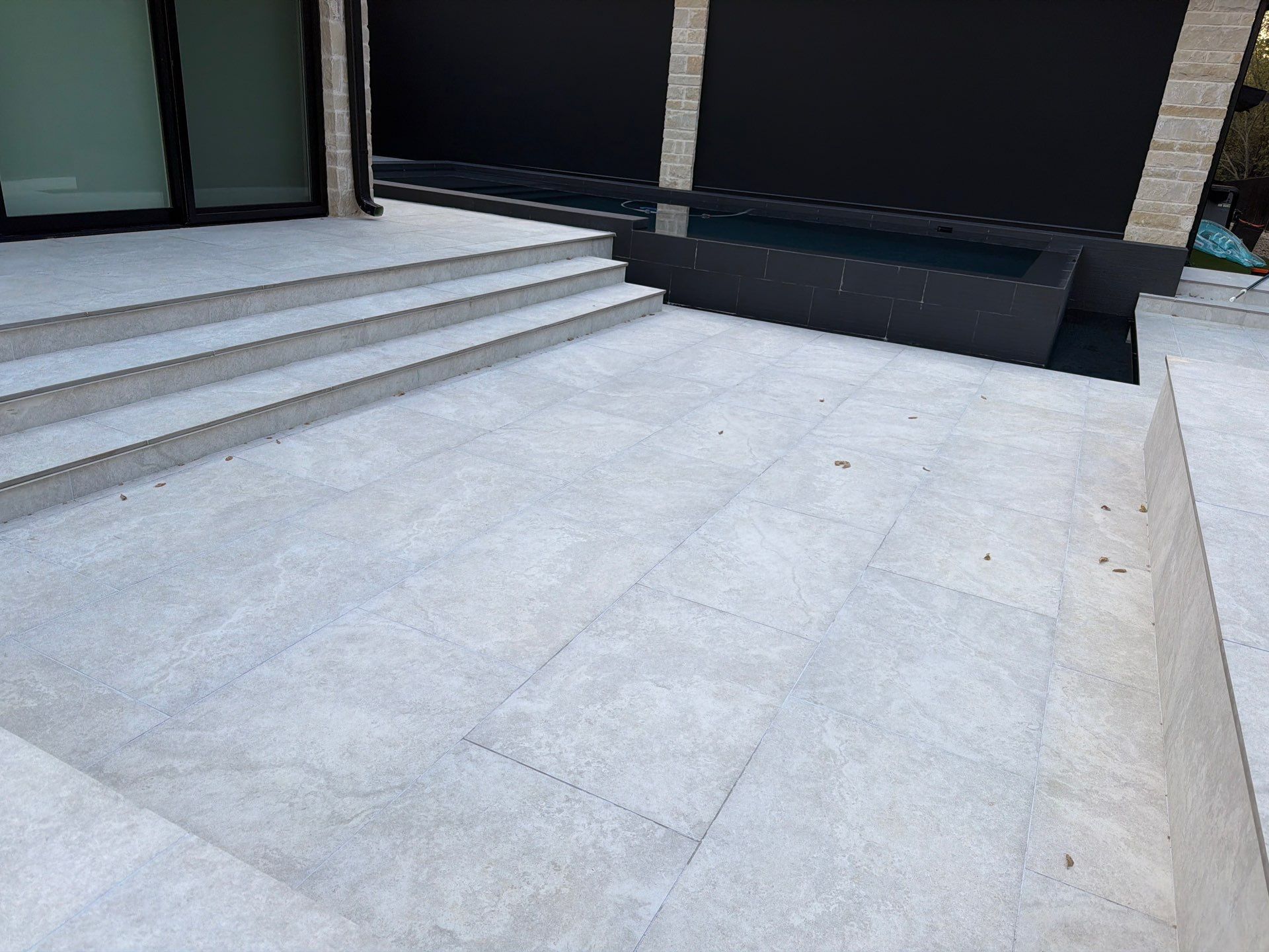 Modern Geometric Pool with Dark Interior Finish by Pinnacle Pools and Spas - DFW