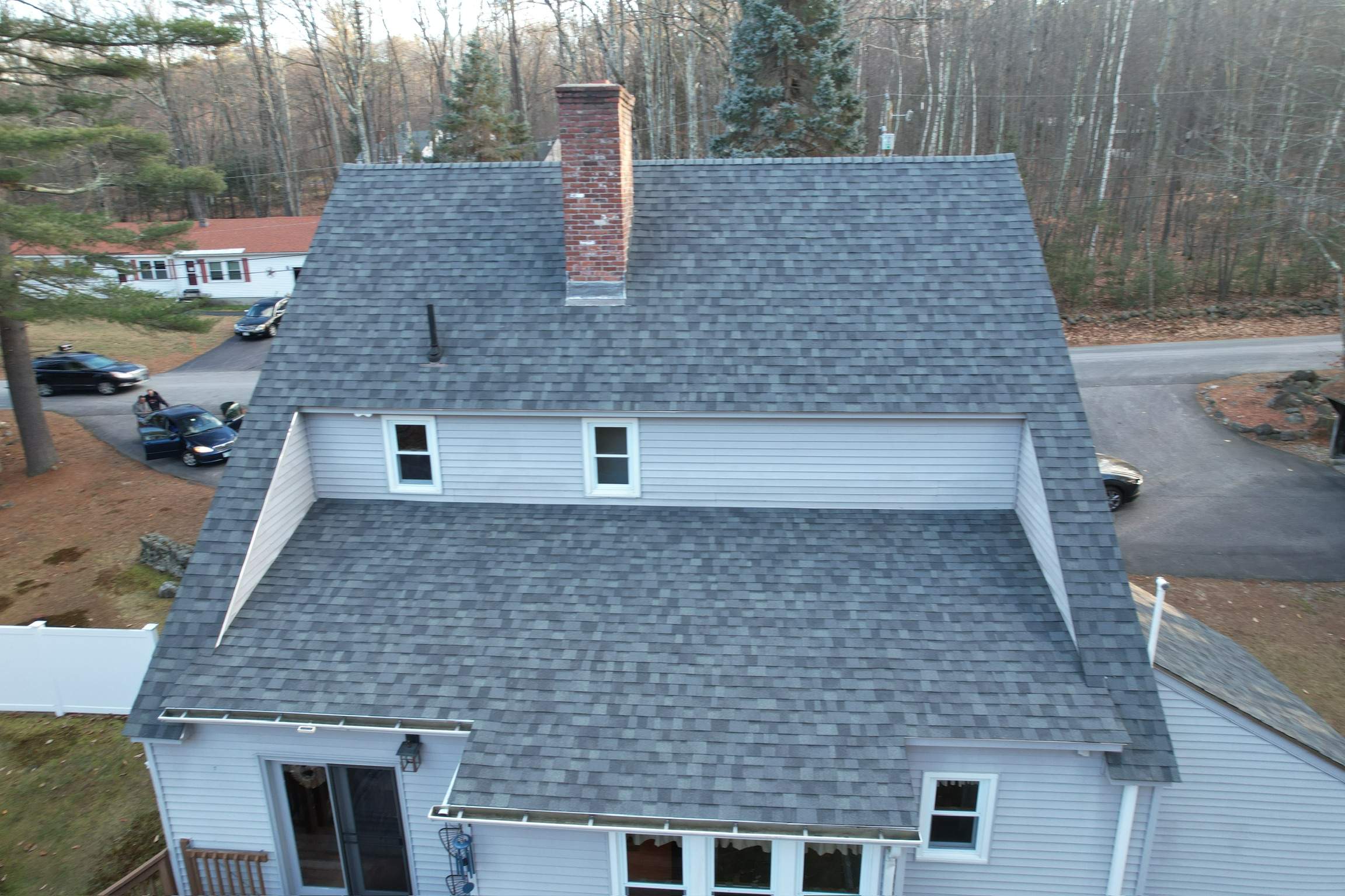 Residential Roofing Installation using Owens Corning Sierra Gray Shingles by Compass exteriors