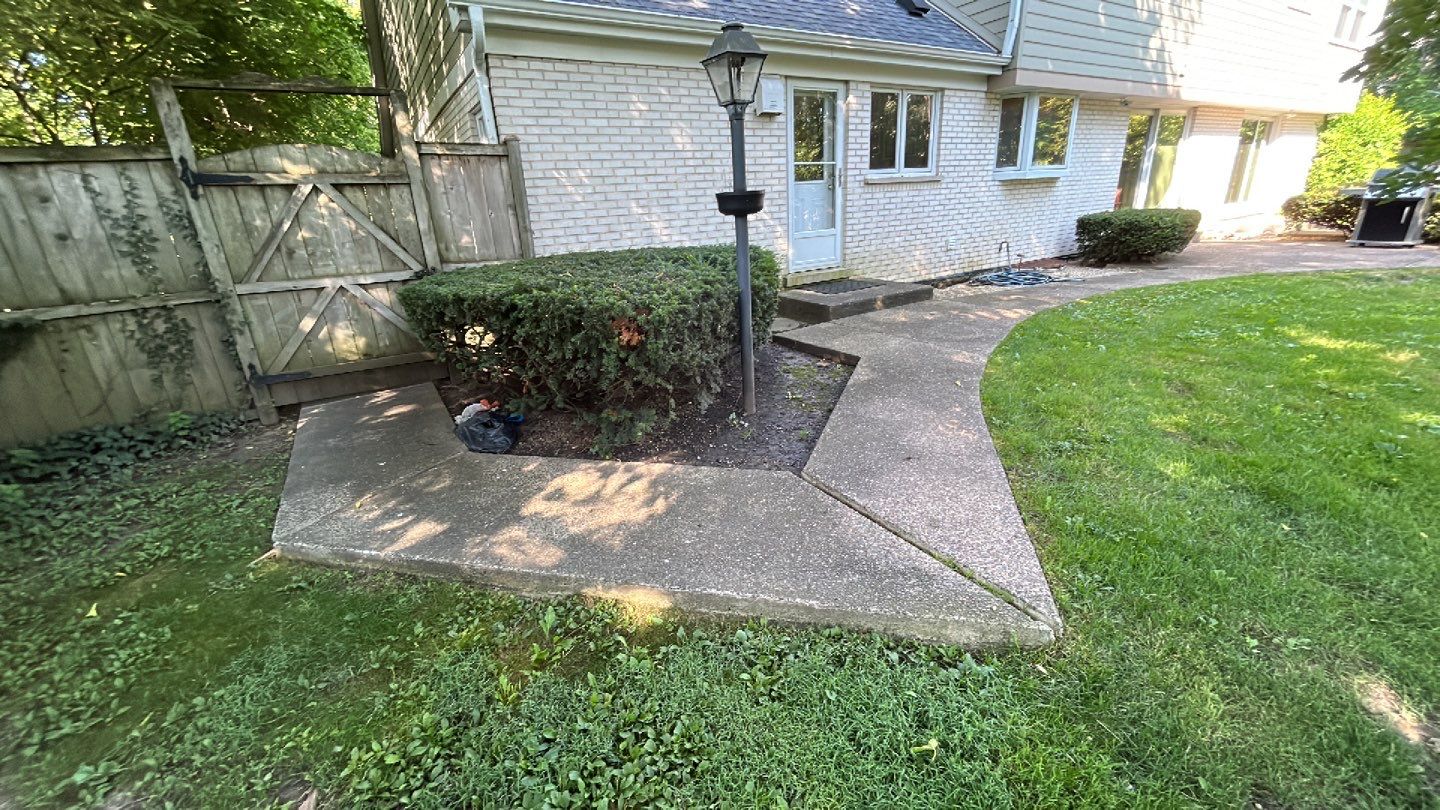 Aggregate concrete cleaning and sealing using Surebond SB-9000 by Northern Power Washing LLC.