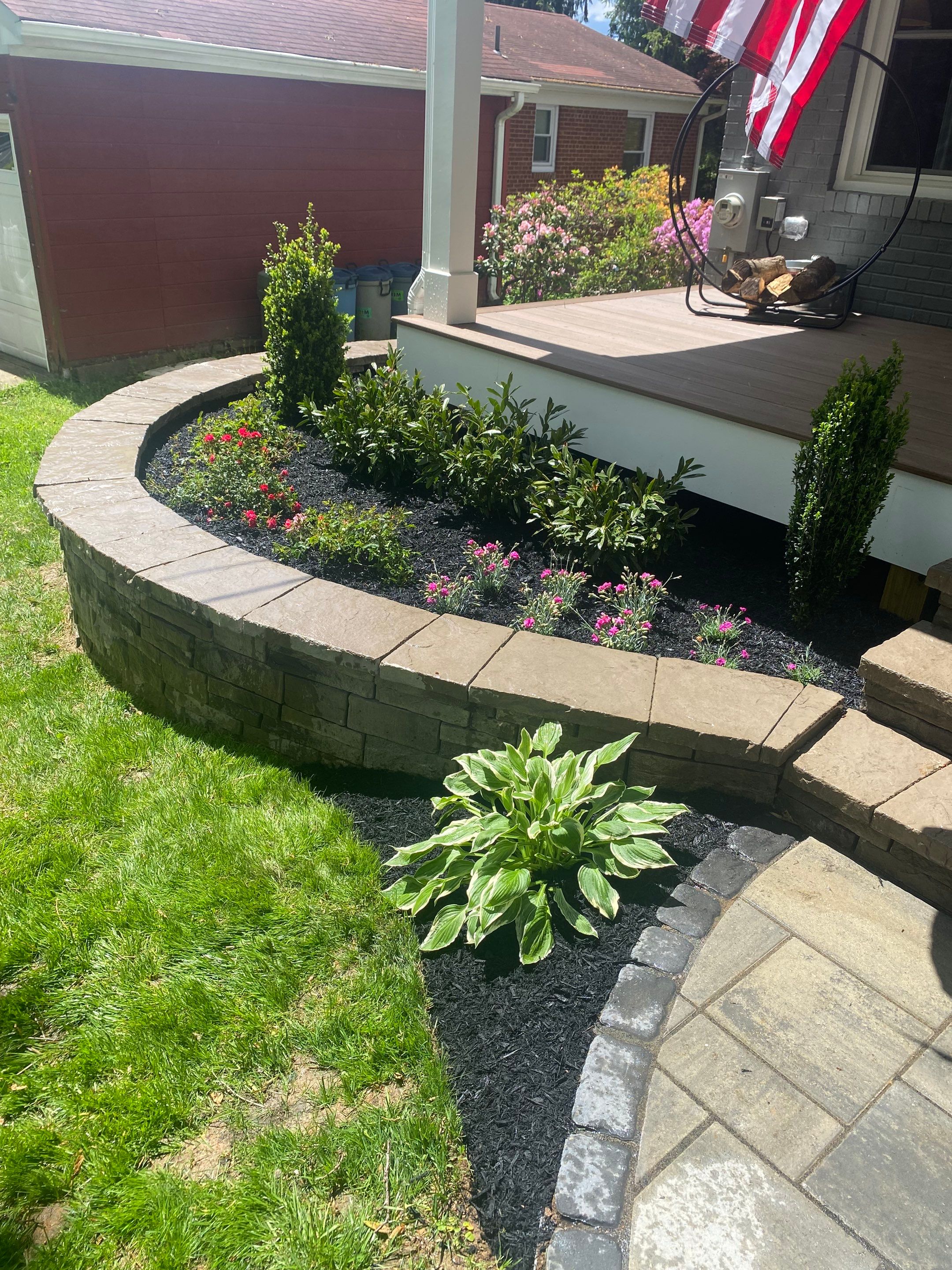 Retaining wall, walkway, small patio and landscape install by The Smet Companies, LLC