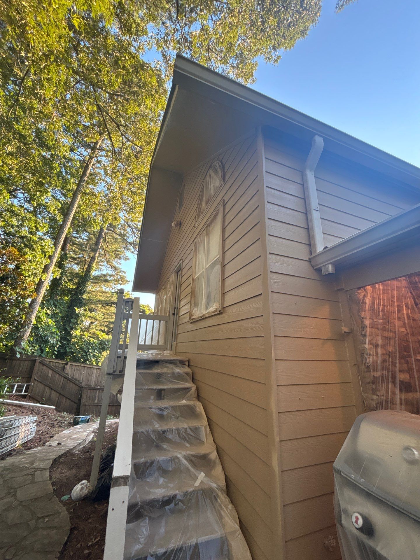 Rotted Wood Replacement, Deck Stain, and Exterior Paint Project in Kennesaw, GA by Nelson Exteriors 