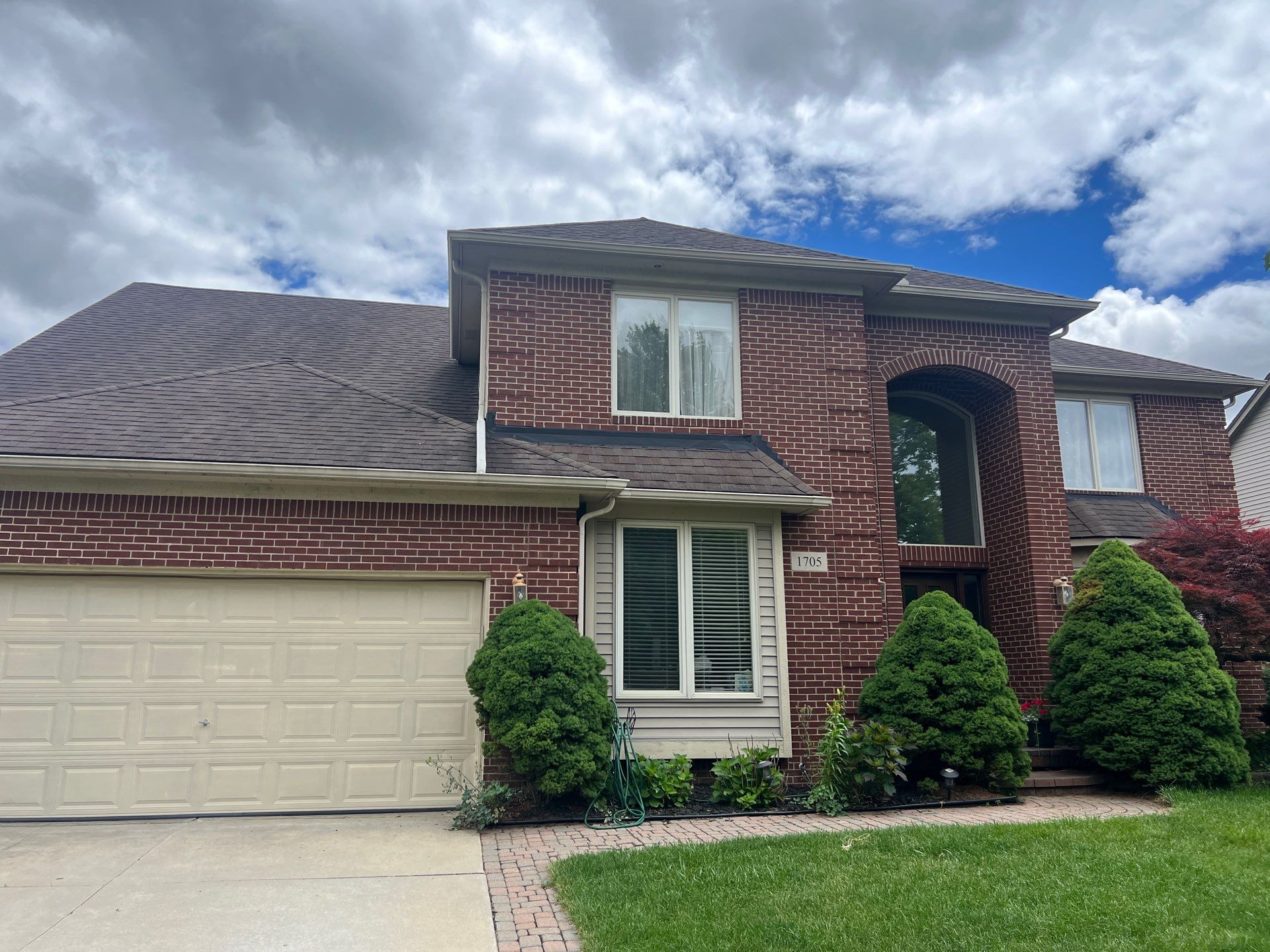 Vinyl Siding and Exterior Trim Painting in Commerce Township by Top Shelf Painter