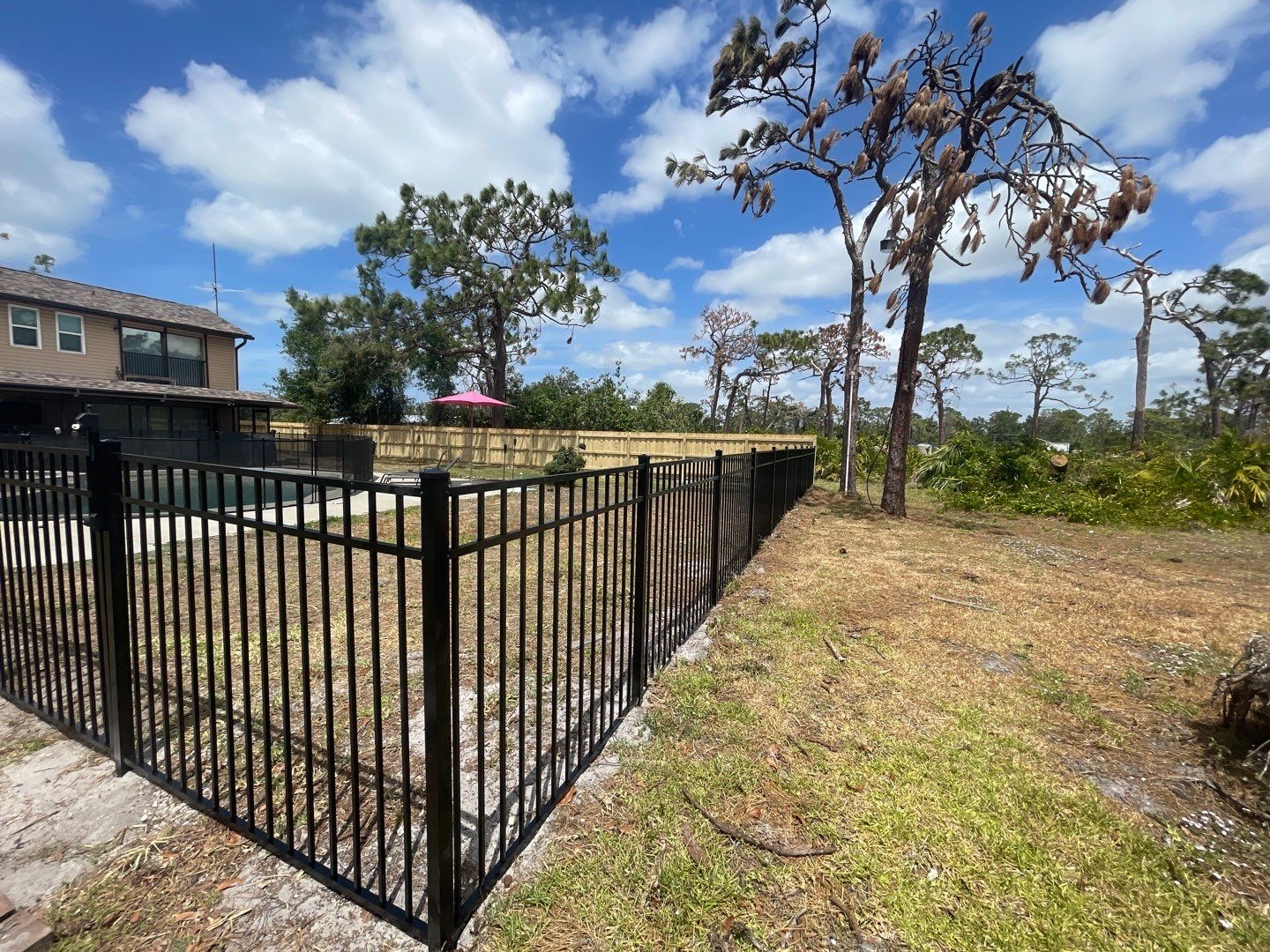 Black Aluminum 3 Rail Fence and Treated Wood Board on Board Privacy Fence  by Asap fence and gates, LLC