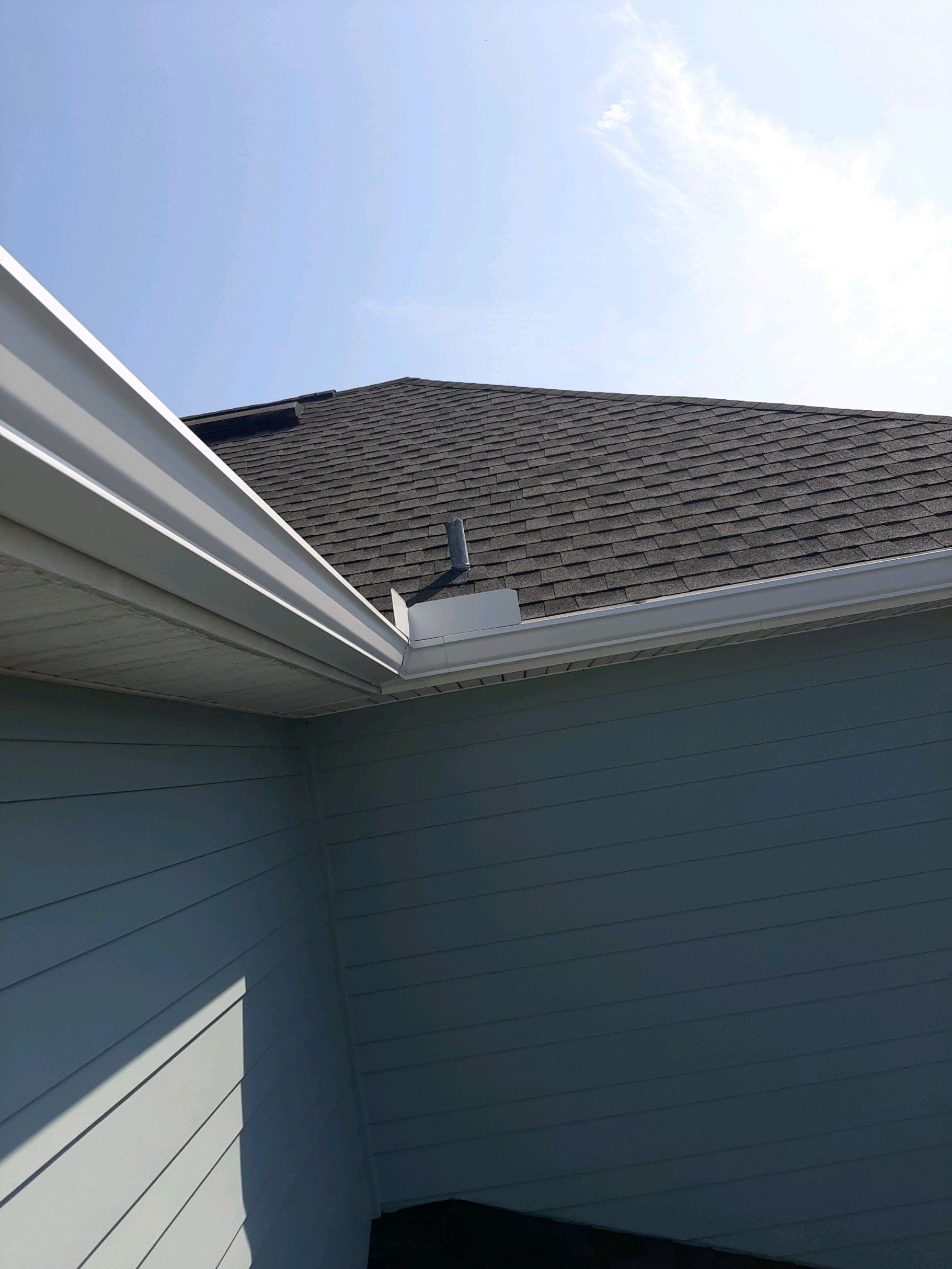 Gutter Installation Using White K-Style 6 Inch Seamless Gutters by Gutter Professors