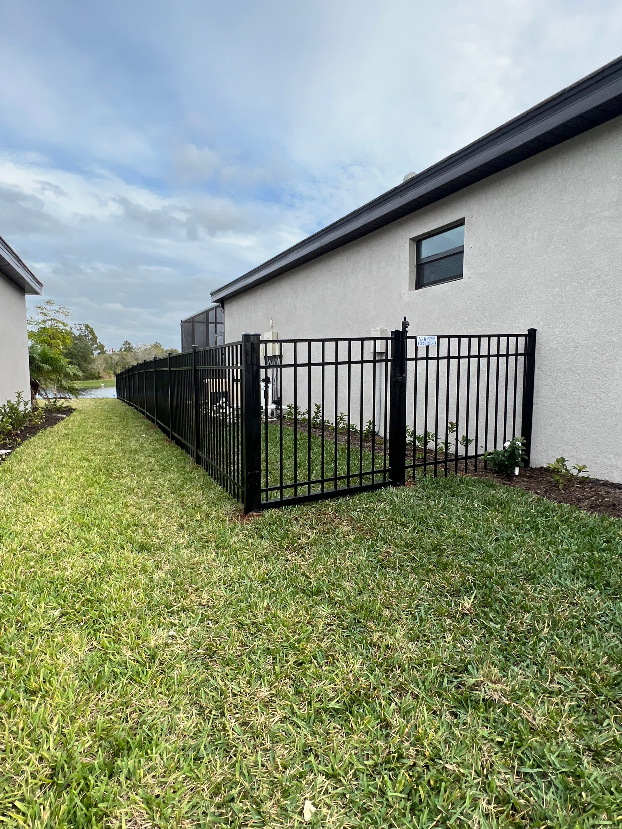 Aluminum Fence Installation using Black 3 Rail Aluminum Fence by Asap fence and gates, LLC
