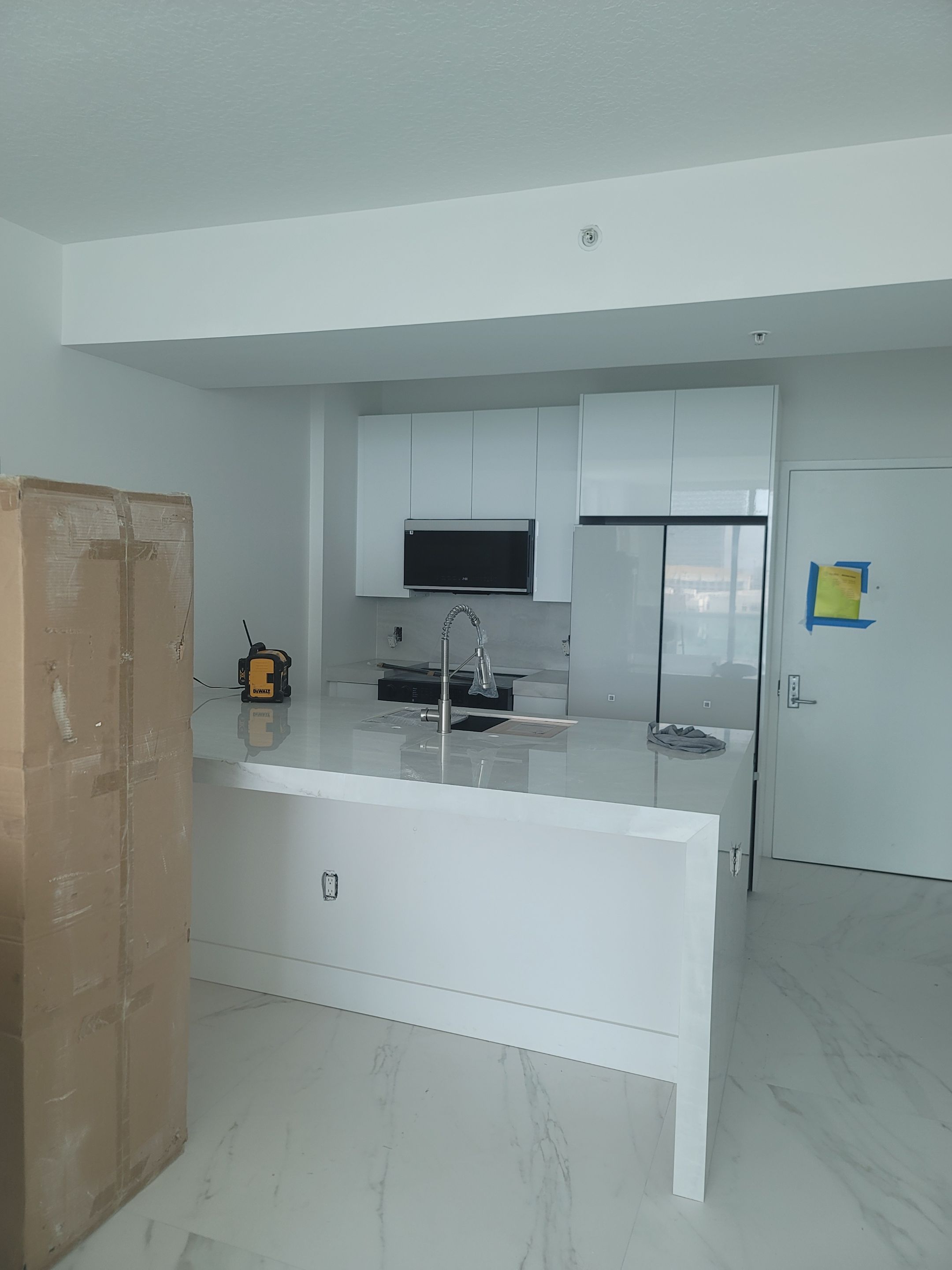 Modern High-Rise Interior Renovation and Custom Tile Installation in Miami by Picos Construction Engineering