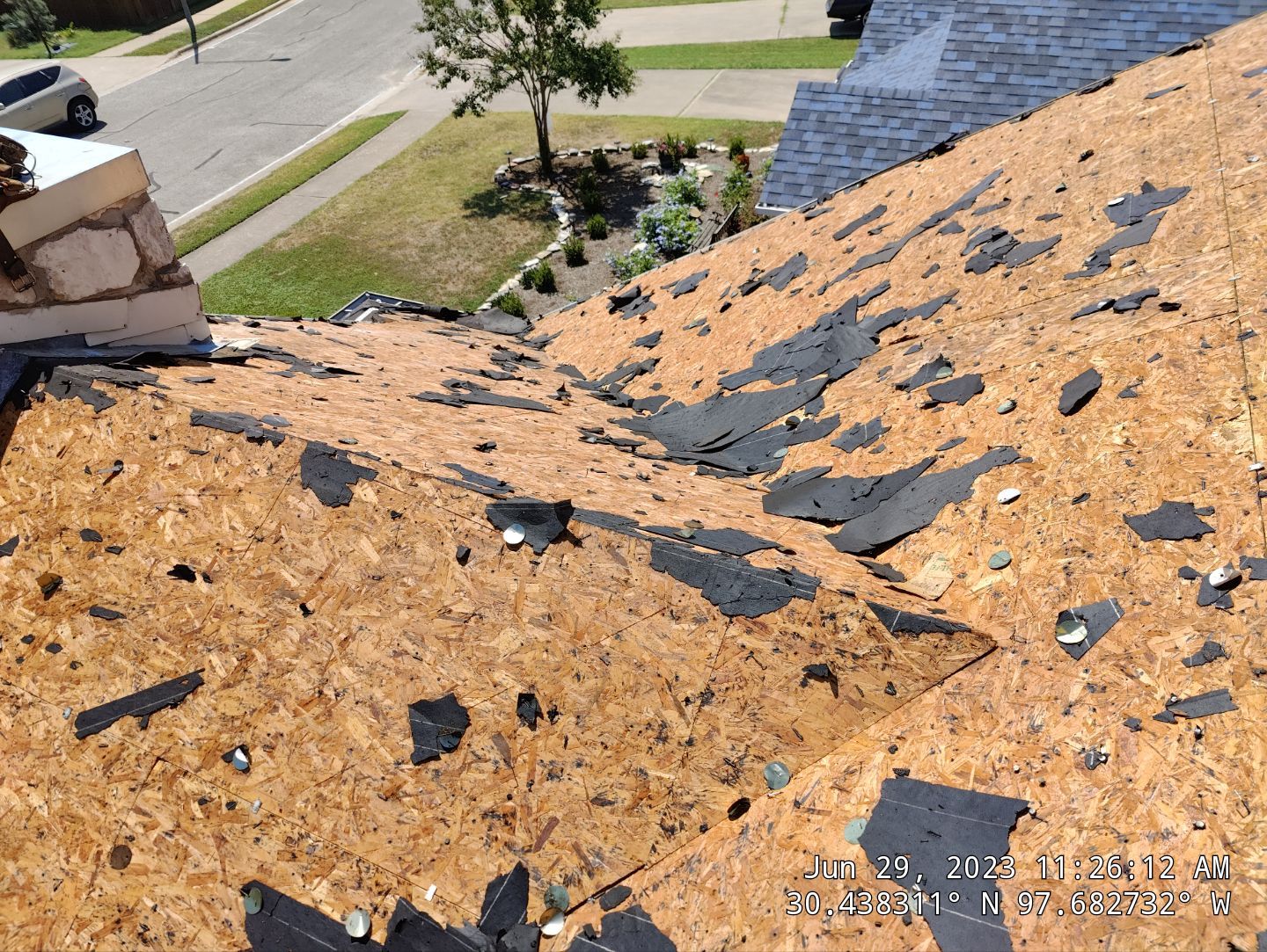 New Roof Installation Of IKO Dynasty Color Brownstone by DeZign Roofing & Exteriors