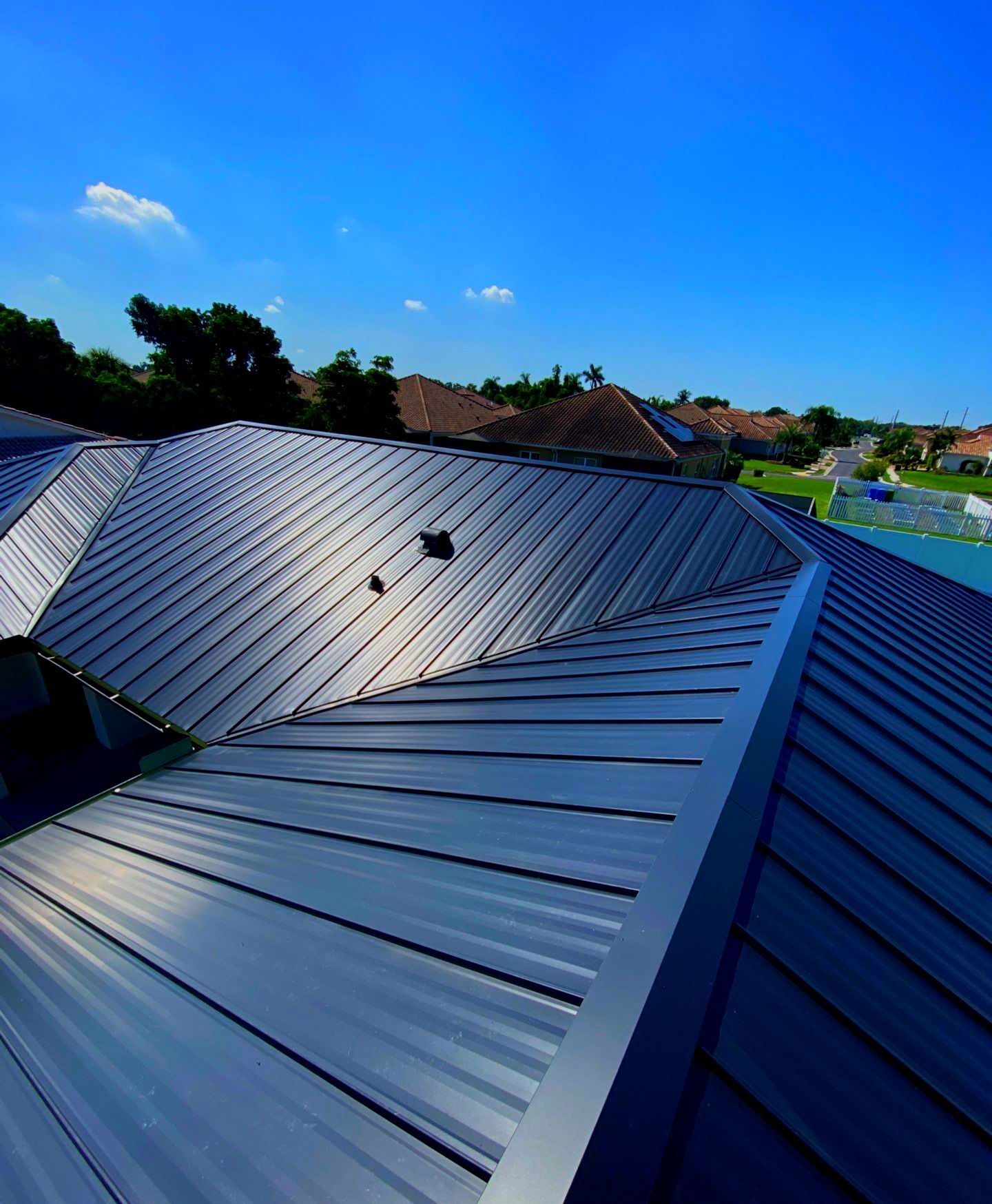 Metal Roofing System by Rooster Roofing, LLC