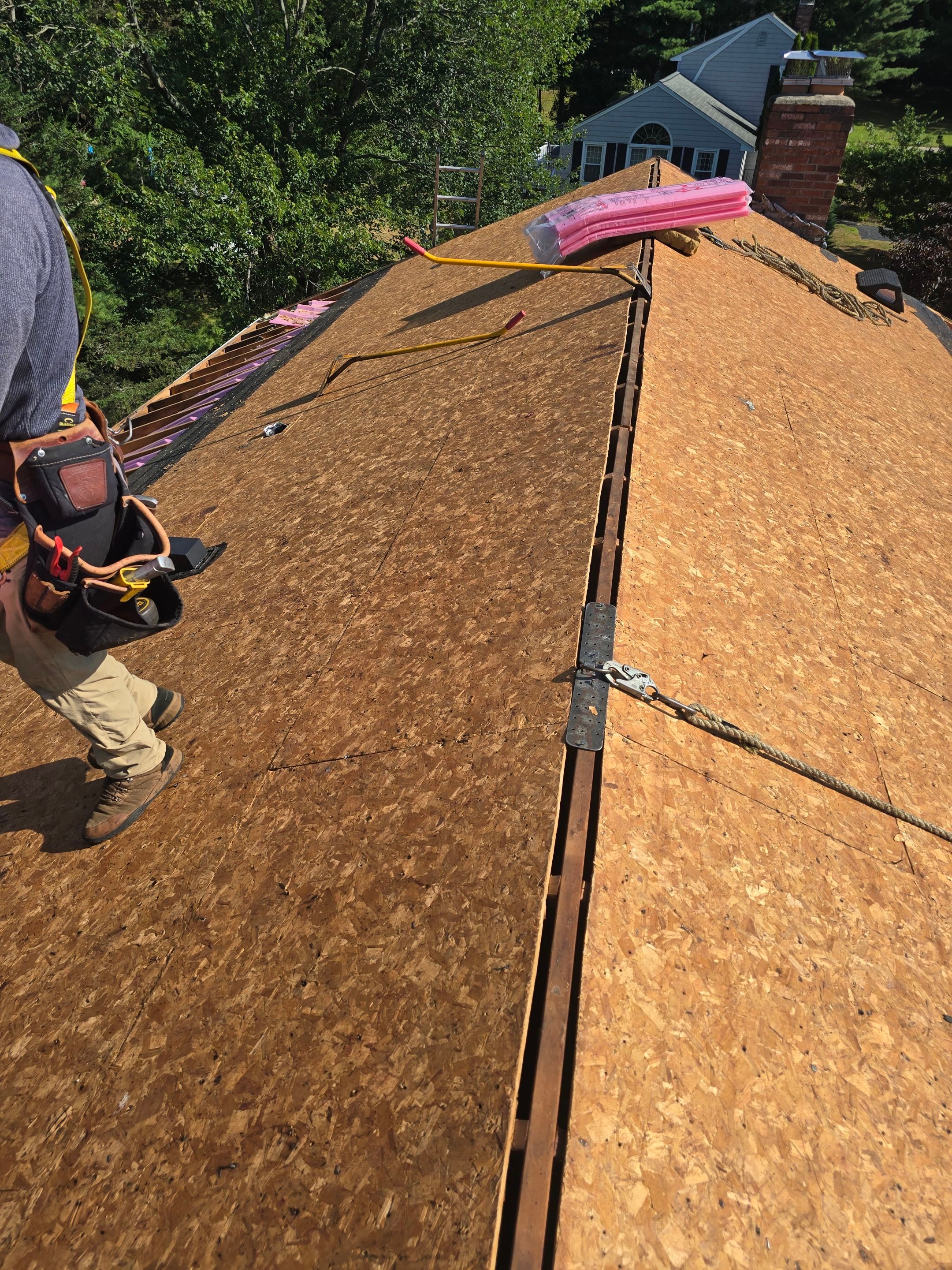Complete Roof Replacement with Chimney Flashing, Gutter Guard System, and Vinyl Siding Repairs by Mighty Dog Roofing of Greater Middlesex County