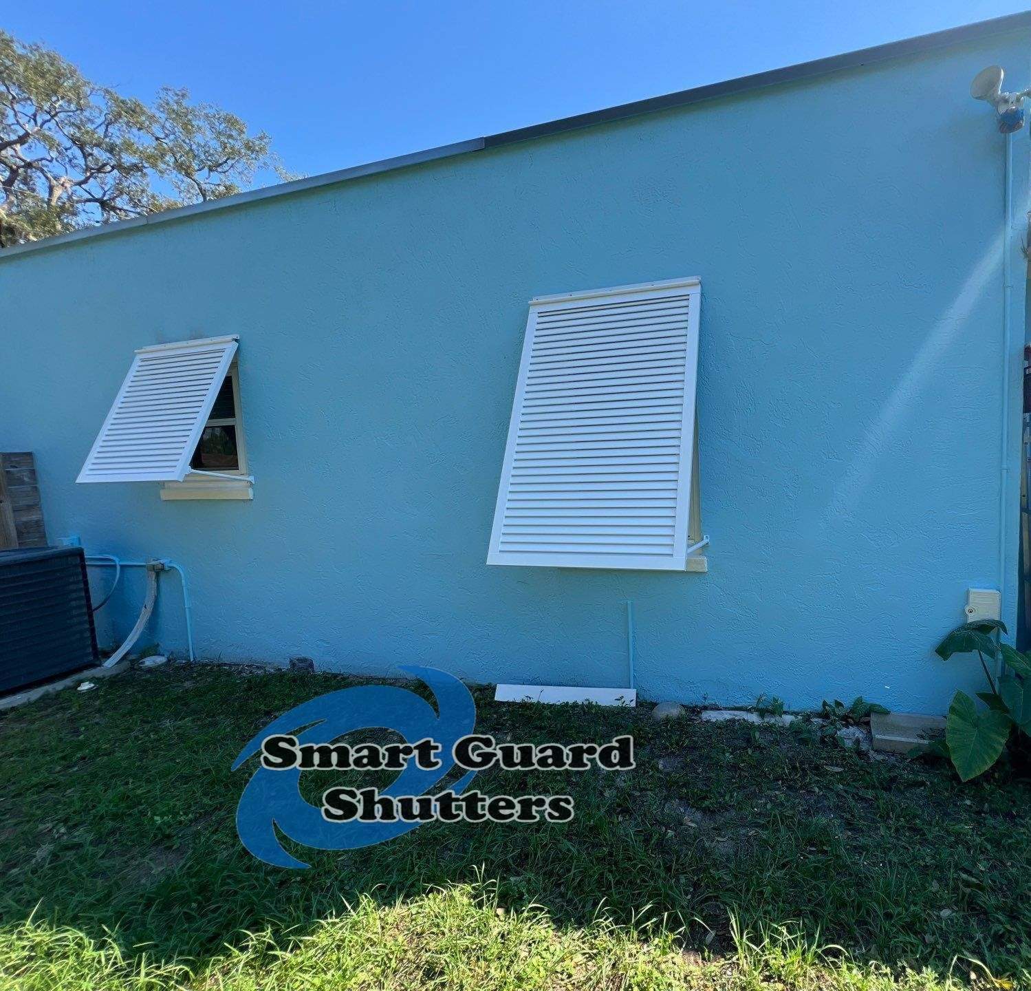 Decorative Bahama Shutters in Signal White  by Smart Guard Shutters