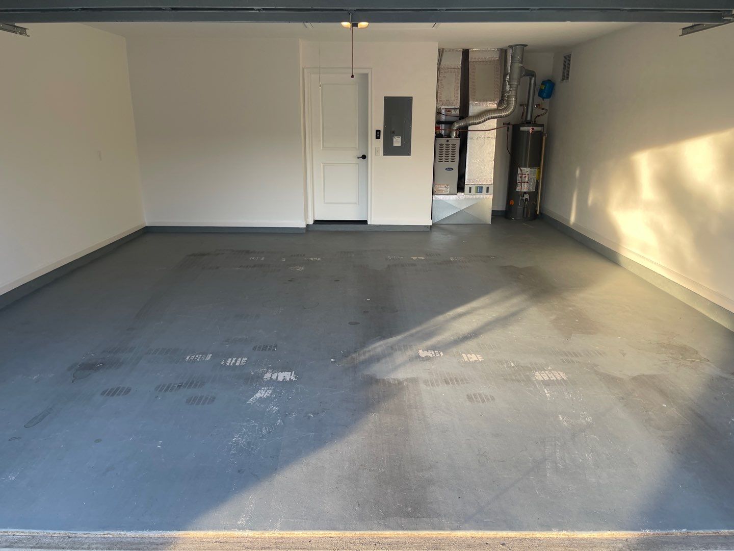 Garage Project in Newberry, FL in Denim by Cross Creek Concrete Coatings