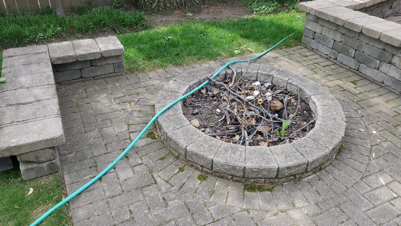 Brick patio repair, clean sand and seal by Northern Power Washing LLC.