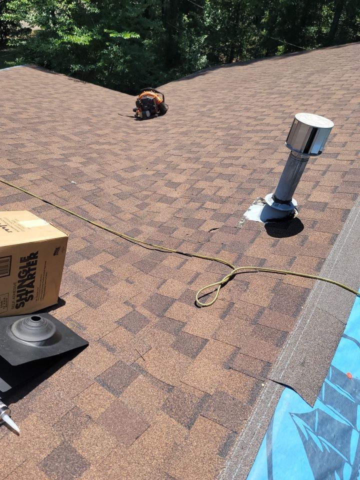 Residential Roofing Repair using Roof Replacement by American Roofing & Construction LLC