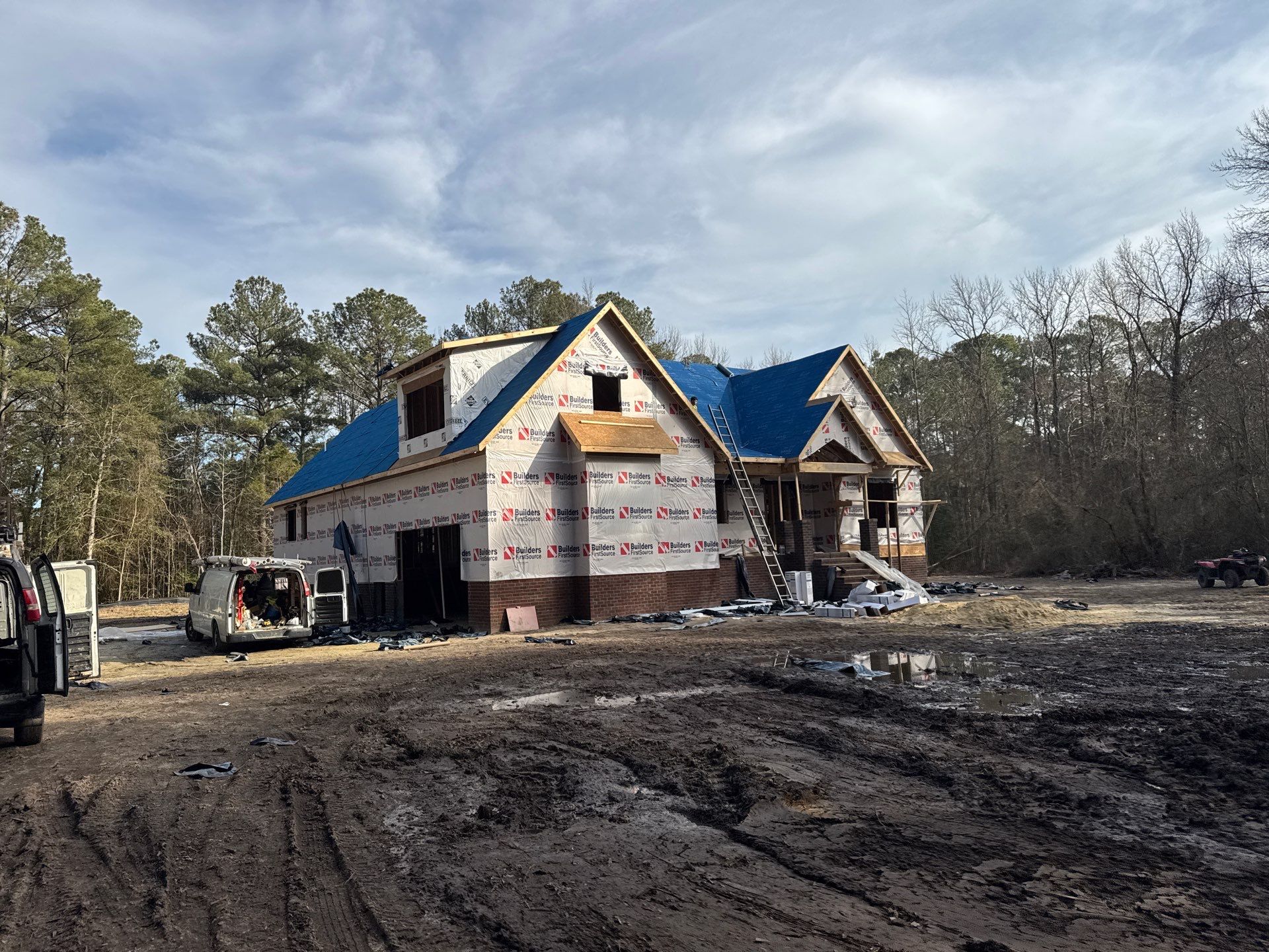 Custom New Construction Home Featuring Standing Seam Metal Roofing in Port Haywood by Cade Construction