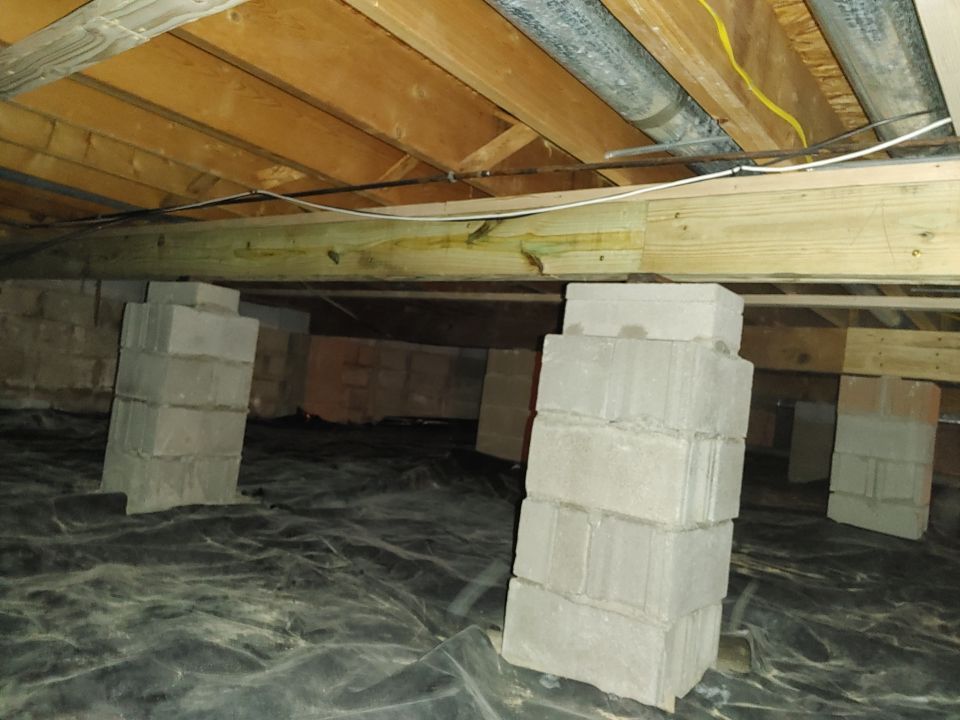 Crawl space encapsulation and Waterproofing using Structural Wood and Steel Reinforcements by Toledo Basement Repair 