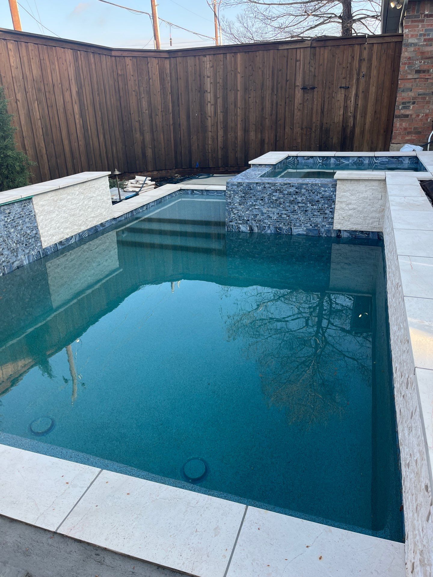 Geometric Pool and Spa with Glass Tile Walls by Pinnacle Pools and Spas - DFW