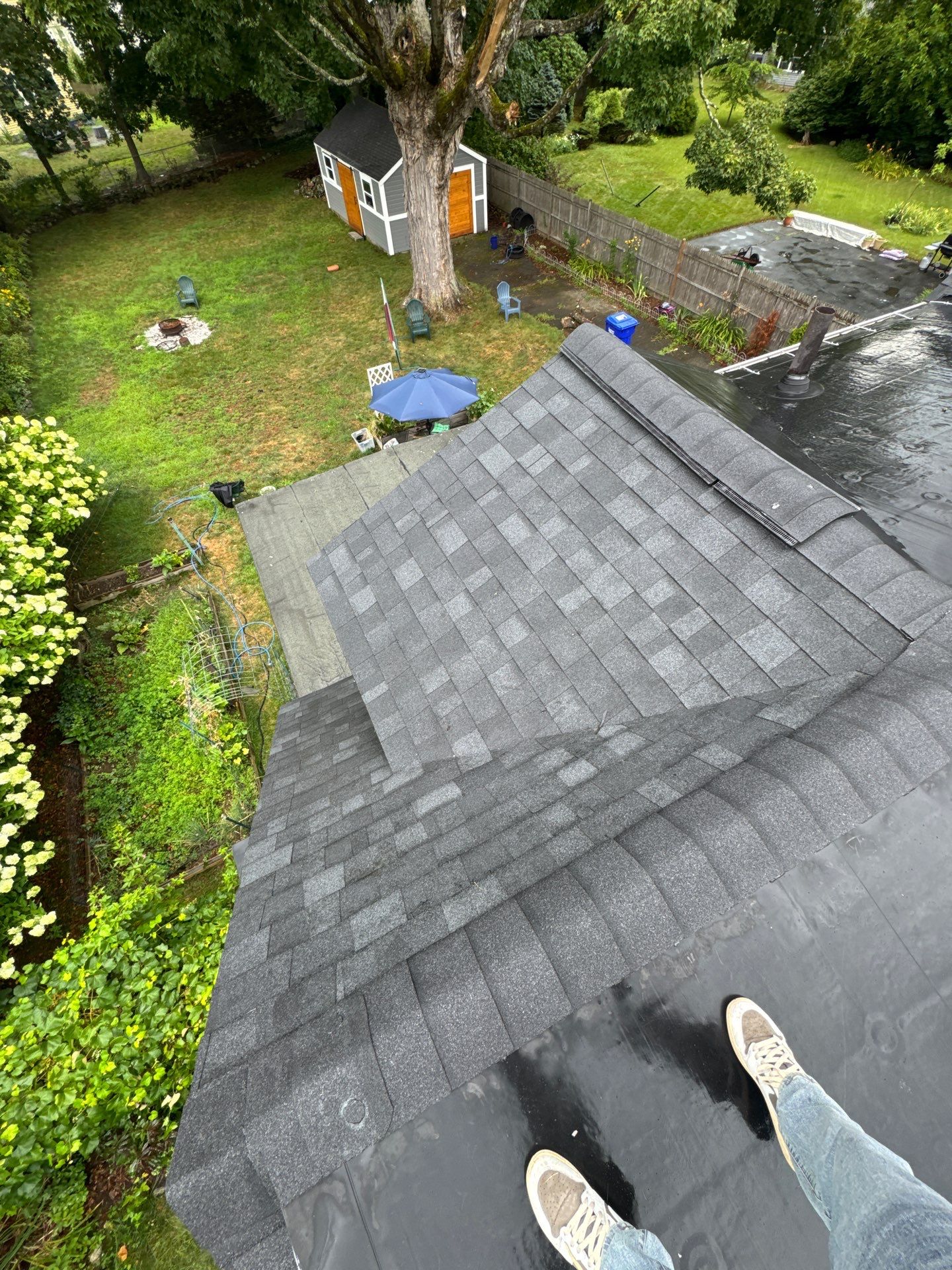 Full Roof Replacement + Custom Gutter Install | Onyx Black Finish by Mighty Dog Roofing of Greater Middlesex County
