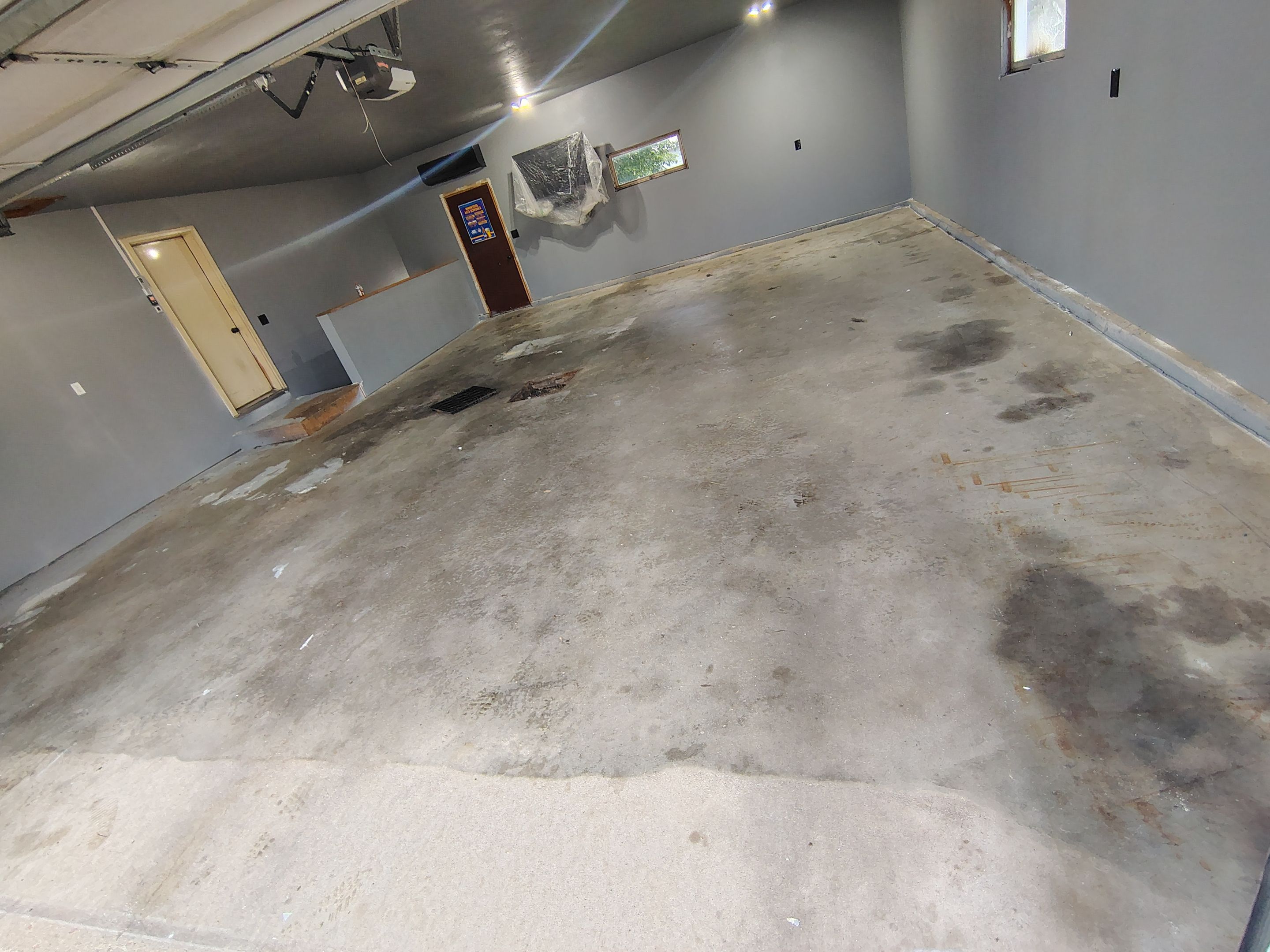 Garage Floor Concrete Coating and Surface Restoration in Colman by Select Painting, Coatings & Garage Cabinets